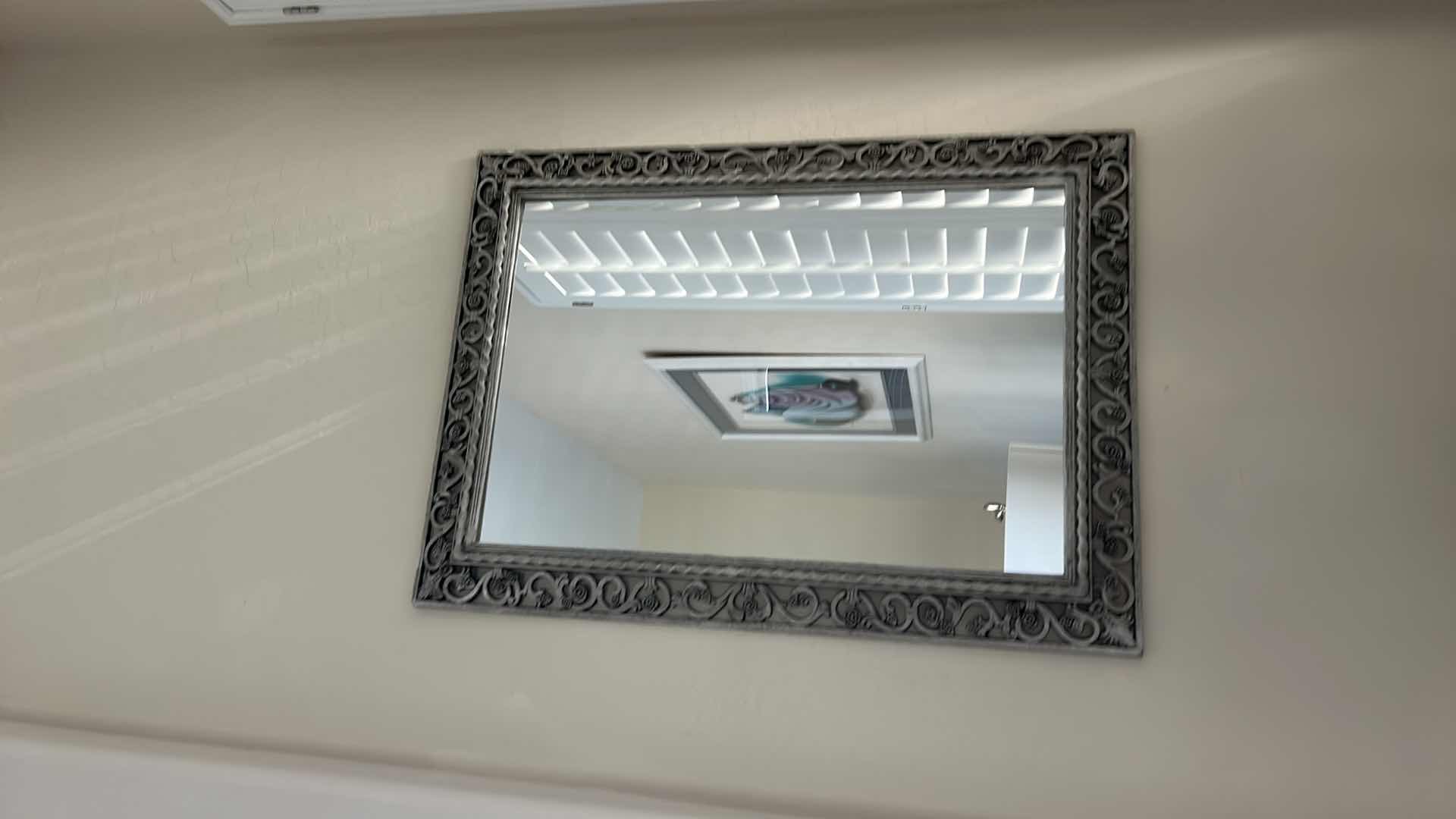 Photo 1 of DECORATIVE RESIN WALL MIRROR WITH ORNATE SCROLL WORK FRAME 26” x H3‘
