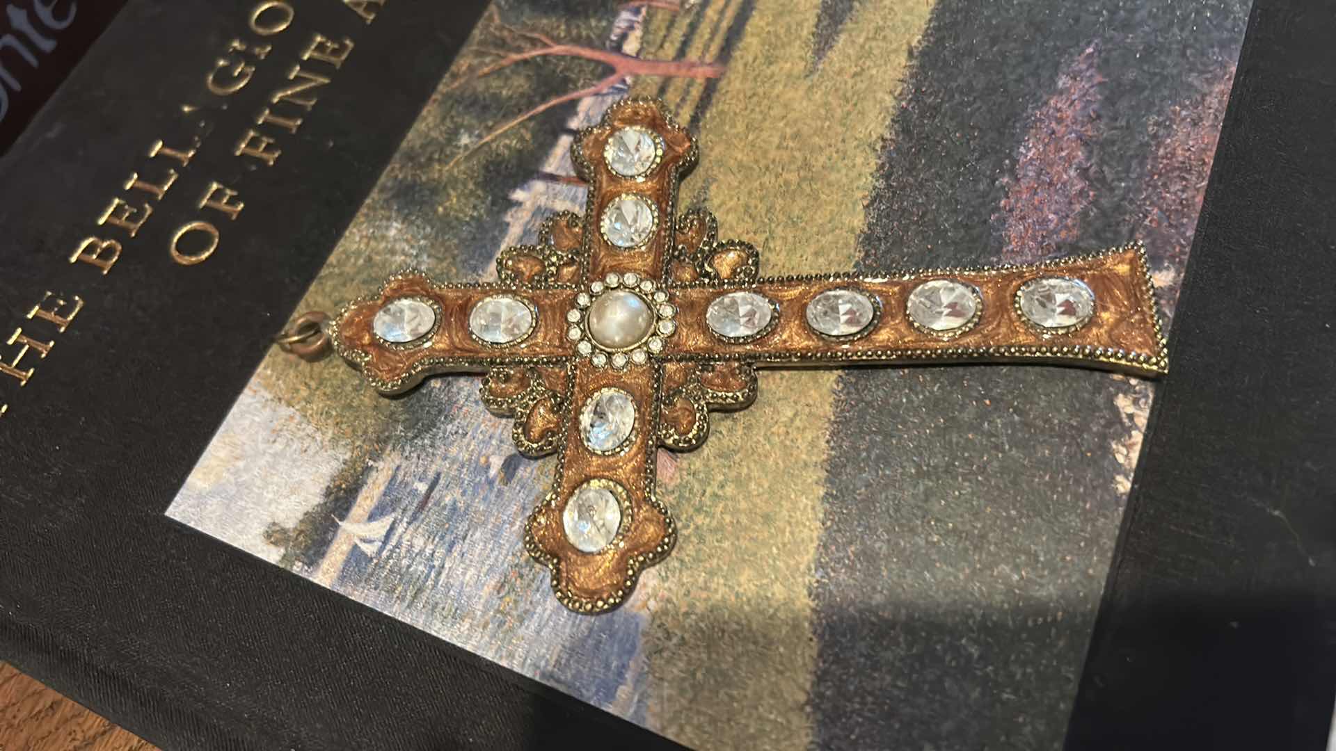 Photo 1 of COFFEE TABLE BOOKS, GAMES, & ORNATE CRUCIFIX