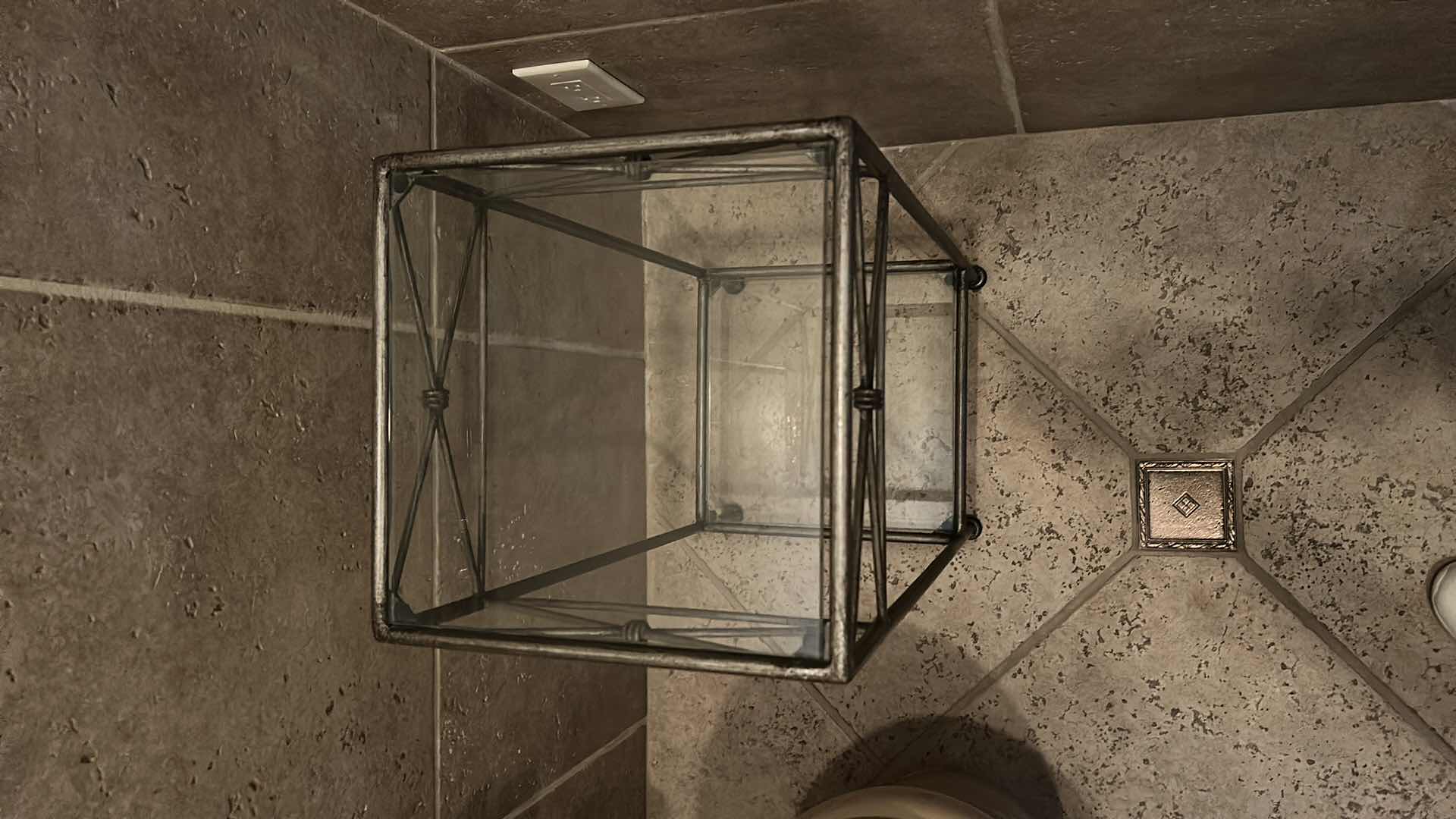 Photo 1 of METAL ACCENT TABLE WITH GLASS SHELVES AND GEOMETRIC FRAME DESIGN 12” x H28 1/2”