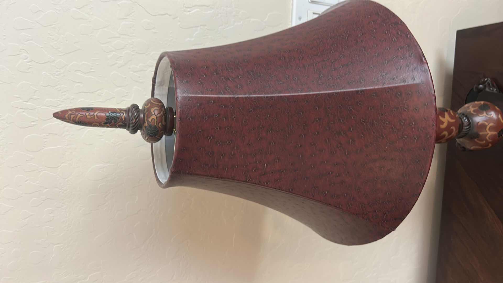 Photo 1 of DECORATIVE TABLE LAMP WITH RED TEXTURED SHADE AND ORNATE BASE H28”