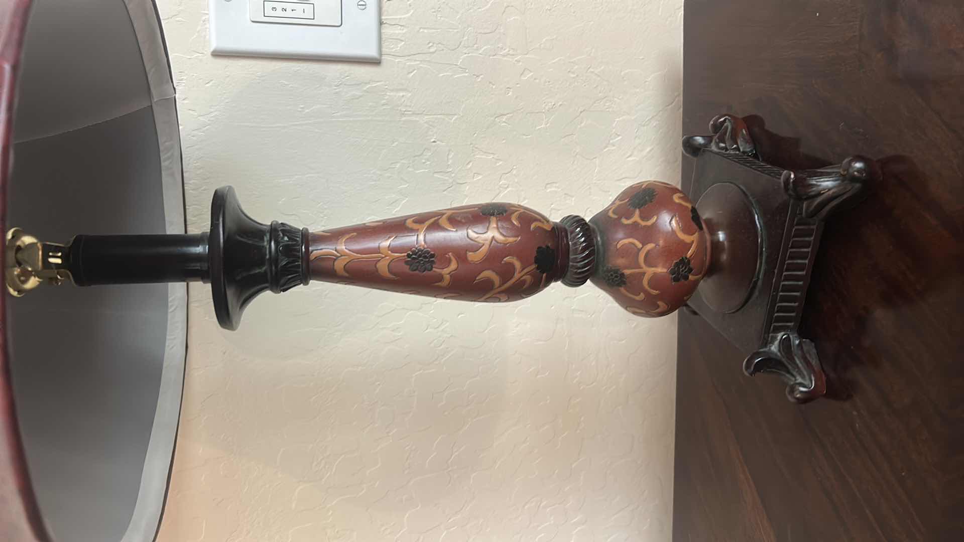 Photo 1 of DECORATIVE TABLE LAMP WITH RED TEXTURED SHADE AND ORNATE BASE H28”