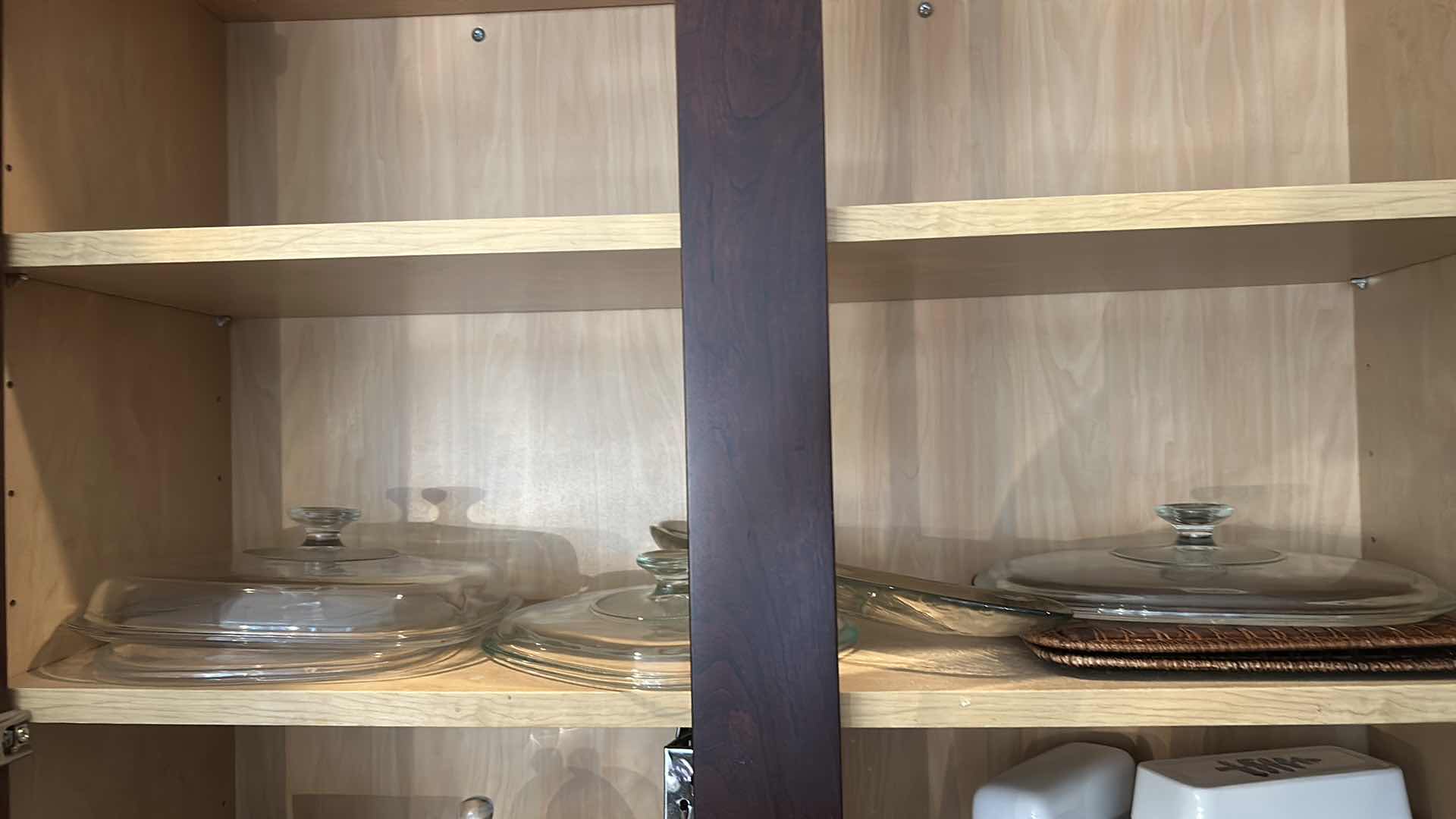 Photo 1 of CONTENTS IN KITCHEN CABINET- PITCHERS, COOKBOOKS, MEASURING CUPS AND MORE