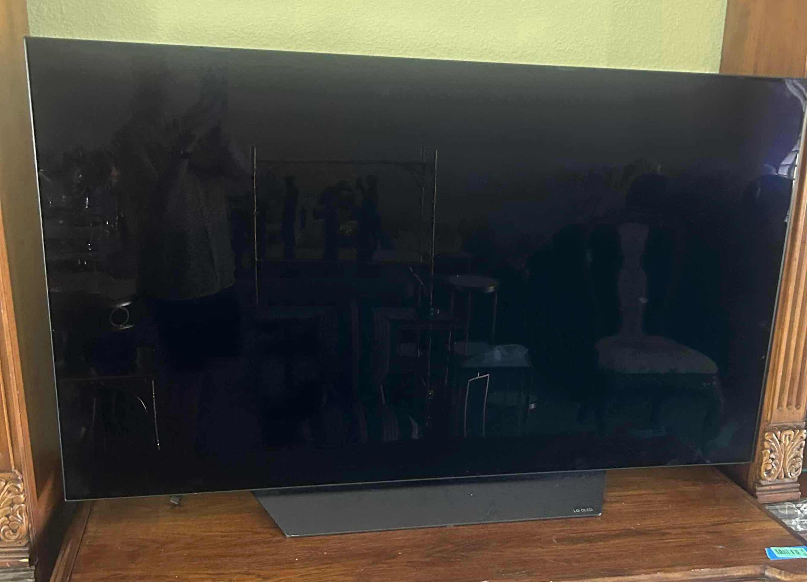 Photo 1 of 50" LG OLED SMART TV W MINIMAL STAND DESIGN W REMOTE