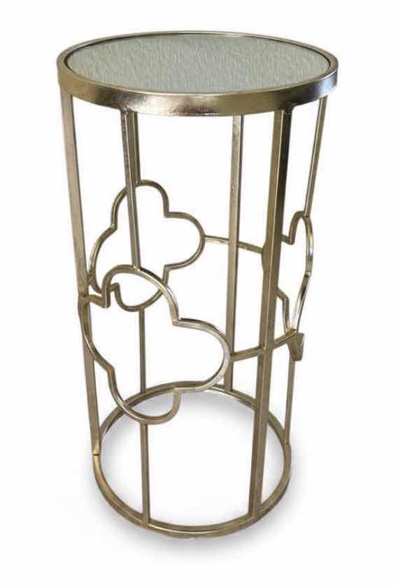 Photo 1 of GOLD METAL SIDE TABLE FROM GRAYSON LANE FEATURING A MIRRORED GLASS TOP AND A CLOVER-SHAPED OPEN FRAME. 12” x H22 1/2”.