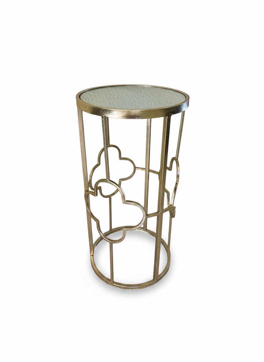 Photo 1 of GOLD METAL SIDE TABLE FROM GRAYSON LANE FEATURING A MIRRORED GLASS TOP AND A CLOVER-SHAPED OPEN FRAME. 12” x H22 1/2”.