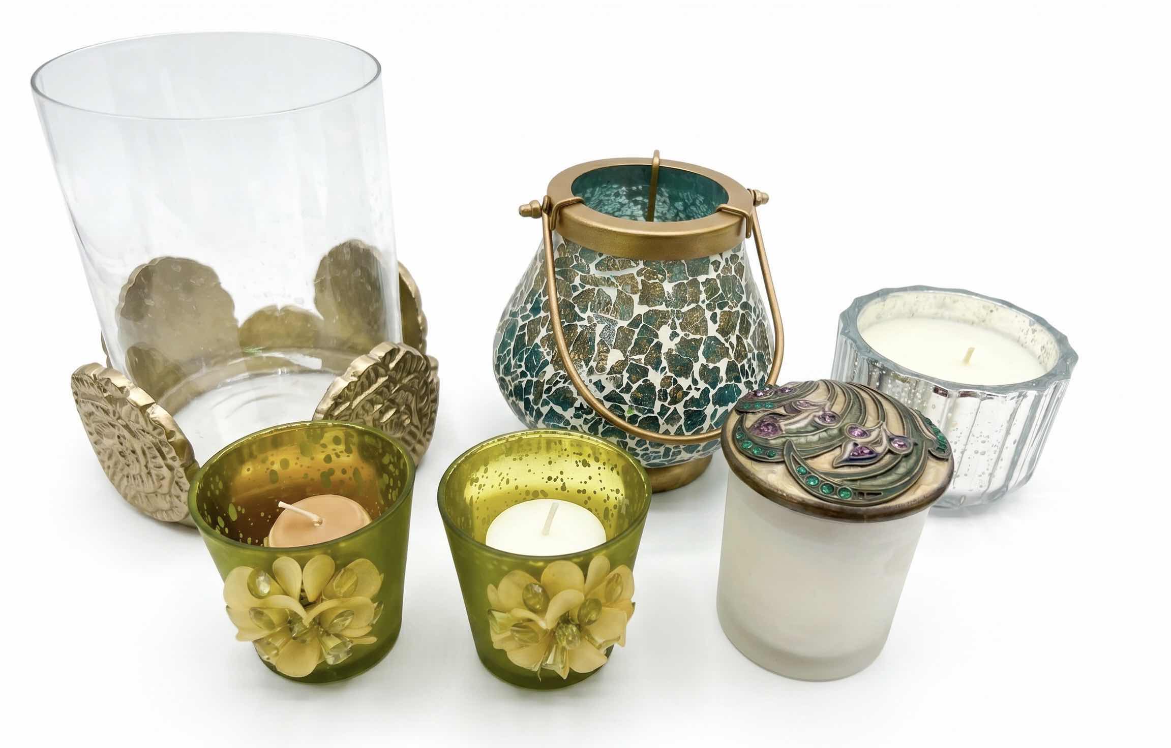 Photo 1 of MOSAIC CANDLE HOLDER LANTERN FEATURES A UNIQUE MIRROR GLASS DESIGN WITH A GOLD HANDLE, DECORATIVE CANDLES AND CANDLE HOLDER WITH FLOWERS