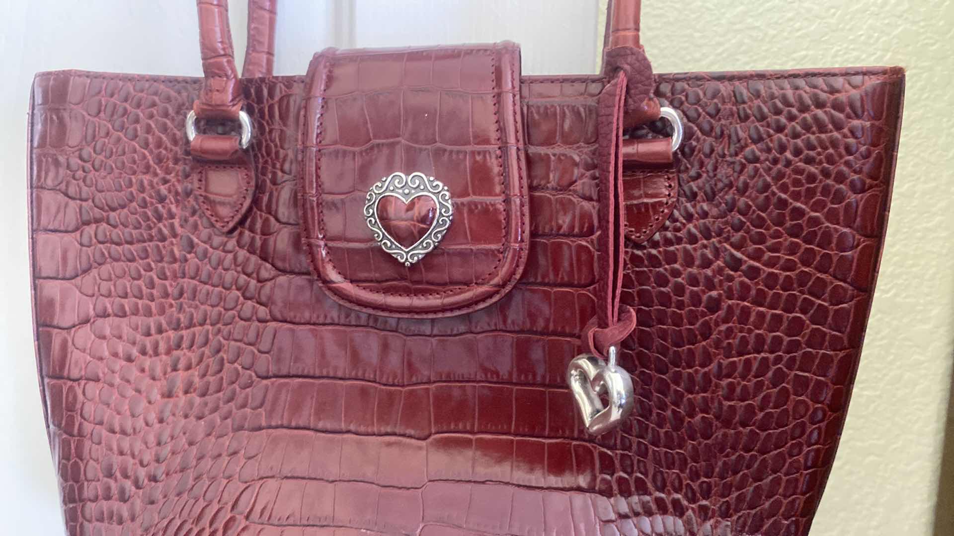 Photo 1 of BURGUNDY BRIGHTON HANDBAG WITH DUST BAG