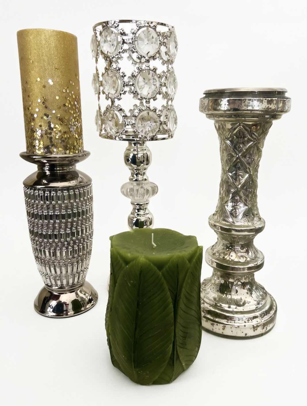 Photo 1 of THREE SILVER TONE CANDLE HOLDERS AND TWO DECORATIVE CANDLES. (TALLEST 16”)