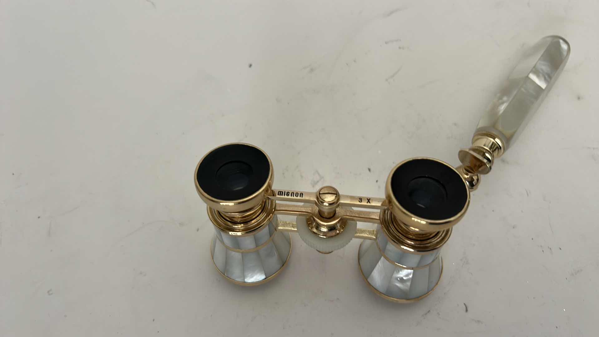 Photo 1 of MIGNON VINTAGE-STYLE OPERA GLASSES FEATURE A GOLD-PLATED BRASS FRAME W INTRICATE MOTHER-OF-PEARL INLAY & MATCHING EXTENDABLE HANDLE.
