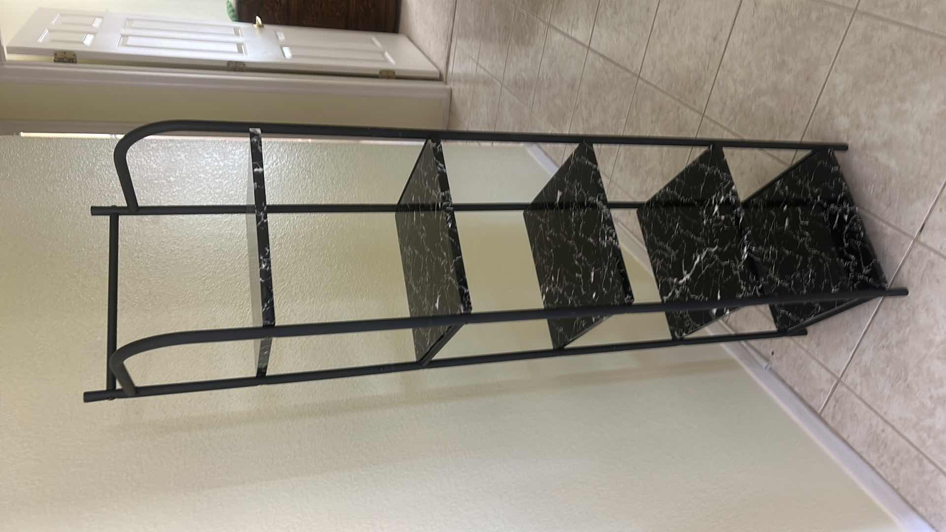 Photo 1 of 5-TIER RACK FEATURES A BLACK IMITATION MARBLE FINISH AND A LIGHTWEIGHT METAL FRAME. 13“ x 11“ x H55.5”