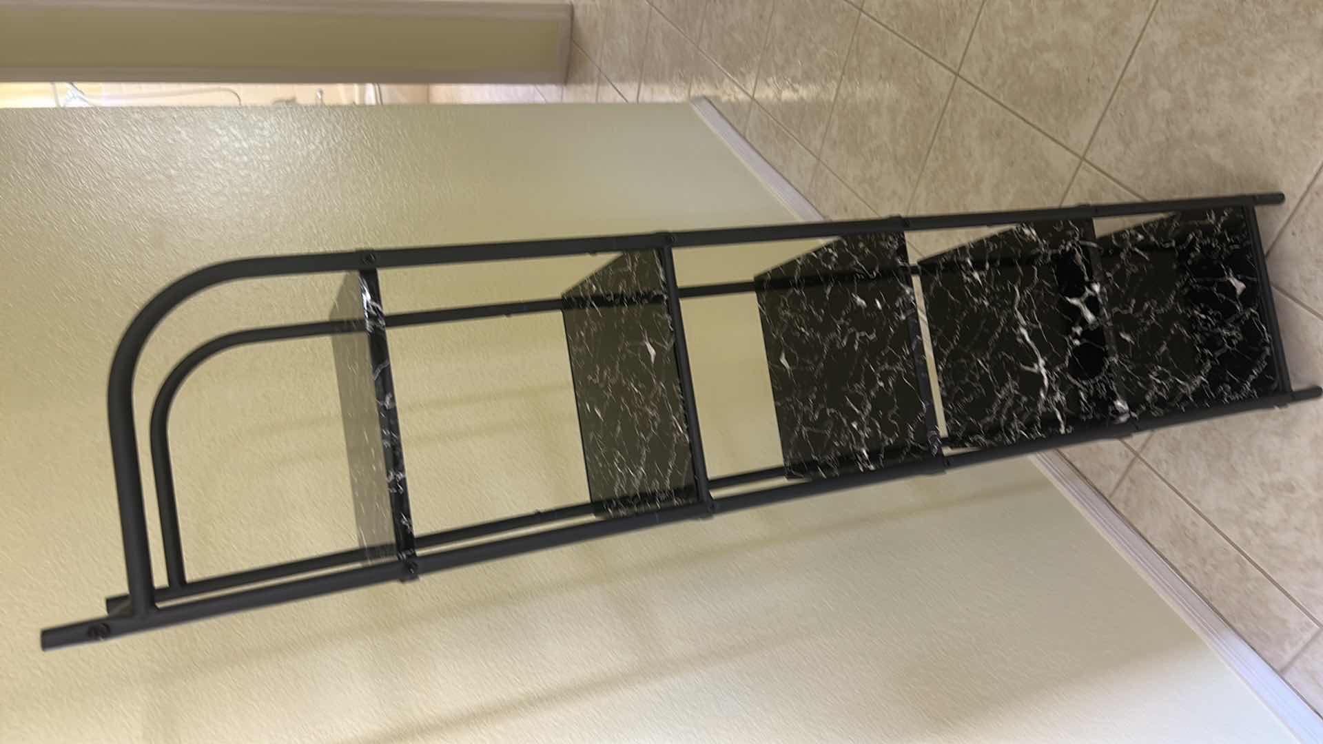 Photo 1 of 5-TIER RACK FEATURES A BLACK IMITATION MARBLE FINISH AND A LIGHTWEIGHT METAL FRAME. 13“ x 11“ x H55.5”