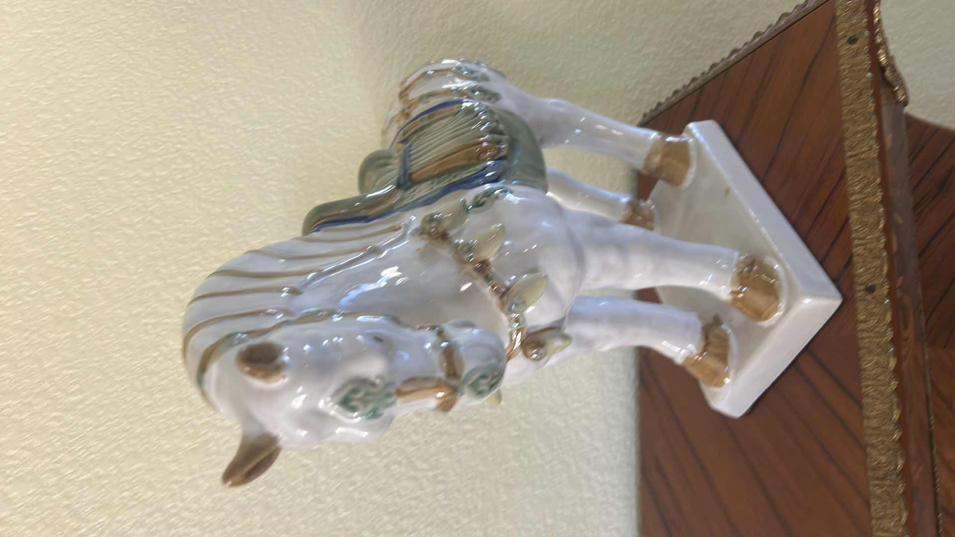 Photo 1 of PORCELAIN TANG HORSE STATUE, ORIENTAL DECOR PIECE FEATURING A WHITE CRACKLE GLAZE AND DETAILED BLUE AND GREEN SADDLERY. H13”