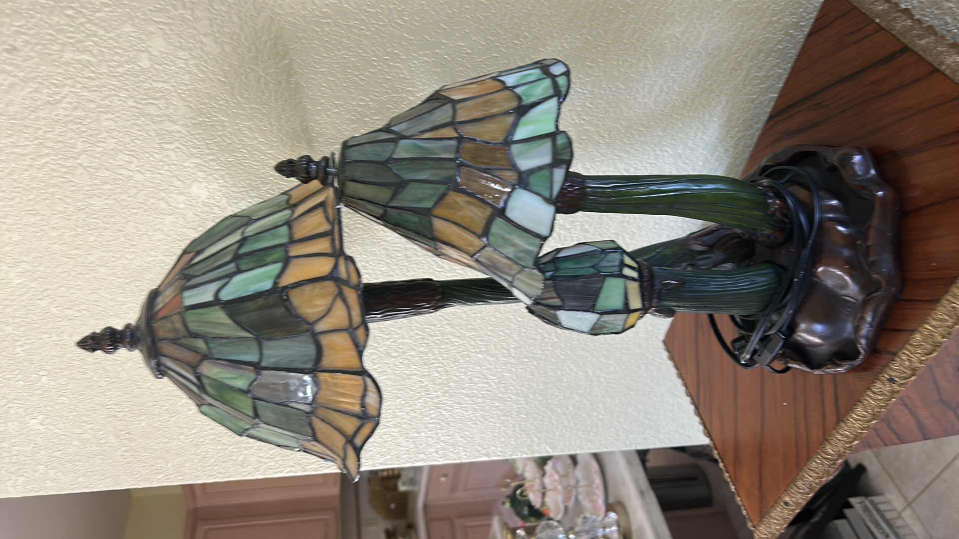 Photo 1 of 20TH-CENTURY ART NOUVEAU STYLE DESK LAMP FEATURING THREE MUSHROOM-SHAPED SHADES MADE OF STAINED GLASS IN GREEN AND AMBER TONES. H21” VALUE $200 to $1000