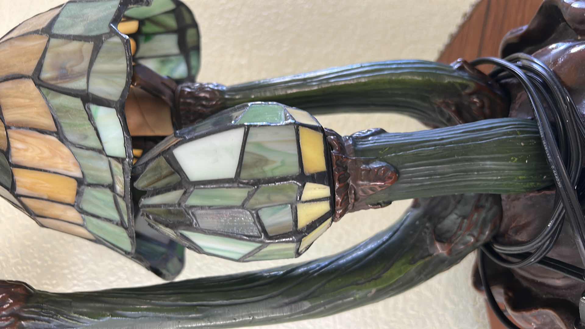 Photo 1 of 20TH-CENTURY ART NOUVEAU STYLE DESK LAMP FEATURING THREE MUSHROOM-SHAPED SHADES MADE OF STAINED GLASS IN GREEN AND AMBER TONES. H21” VALUE $200 to $1000
