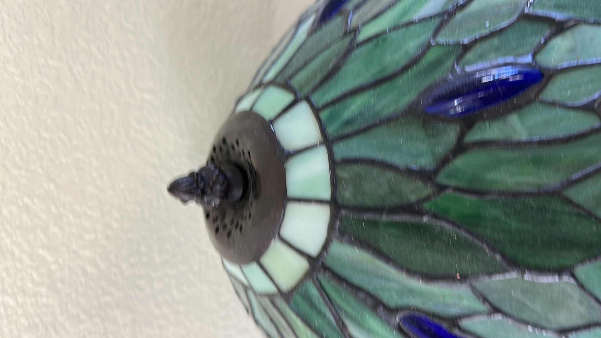 Photo 1 of DRAGONFLY TABLE LAMP FEATURES A GREEN STAINED GLASS SHADE WITH RED AND BLUE JEWELED INSERTS, RESEMBLING STYLES OFFERED BY WAREHOUSE OF TIFFANY. H19”