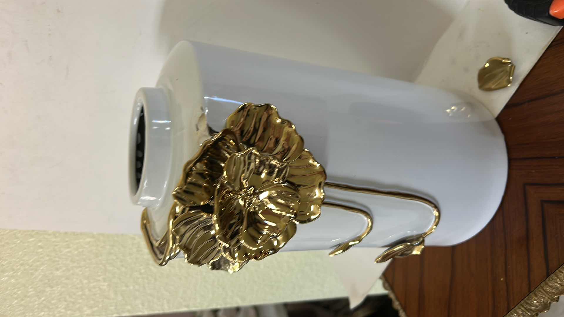 Photo 1 of CERAMIC VASE FEATURES A LARGE, SCULPTURAL GOLD FLOWER DETAIL. H12”