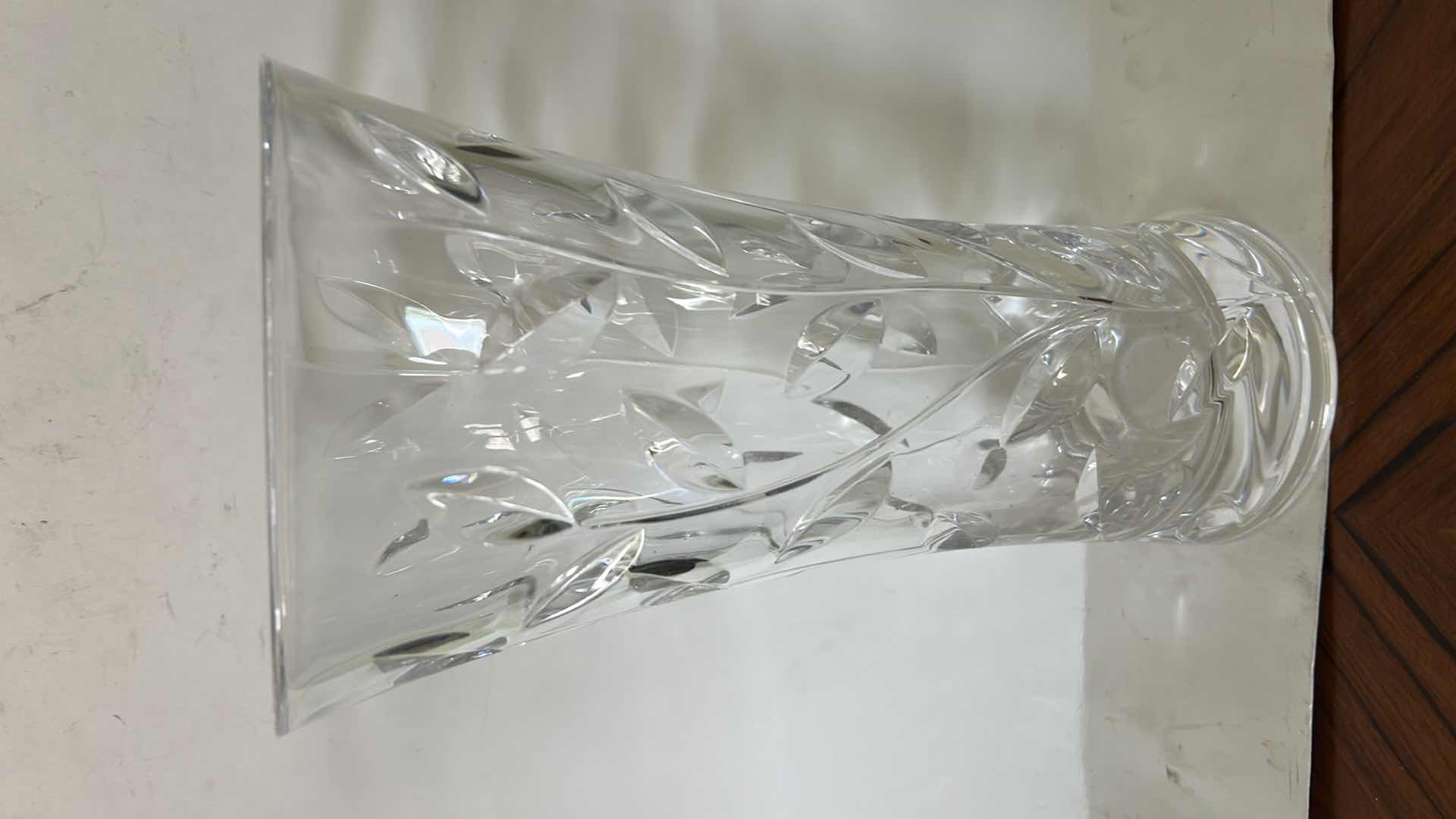 Photo 1 of ROYAL CRYSTAL ROCK LAURUS COLLECTION VASE FEATURES A DISTINCT CUT LEAF AND VINE DESIGN THROUGHOUT THE CLEAR CRYSTAL BODY. H11.75” $60