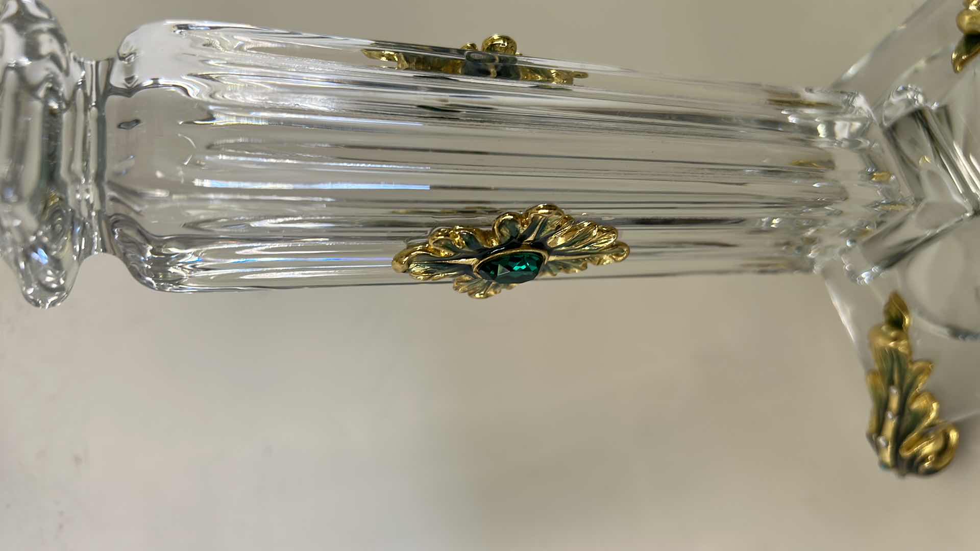 Photo 1 of ORNATE BAROQUE-STYLE CRYSTAL CANDLESTICK FEATURES DISTINCTIVE GOLD-LEAF EMBELLISHMENTS AND EMERALD-COLORED JEWEL ACCENTS. H13” & BATTERY OPERATED CANDLE.