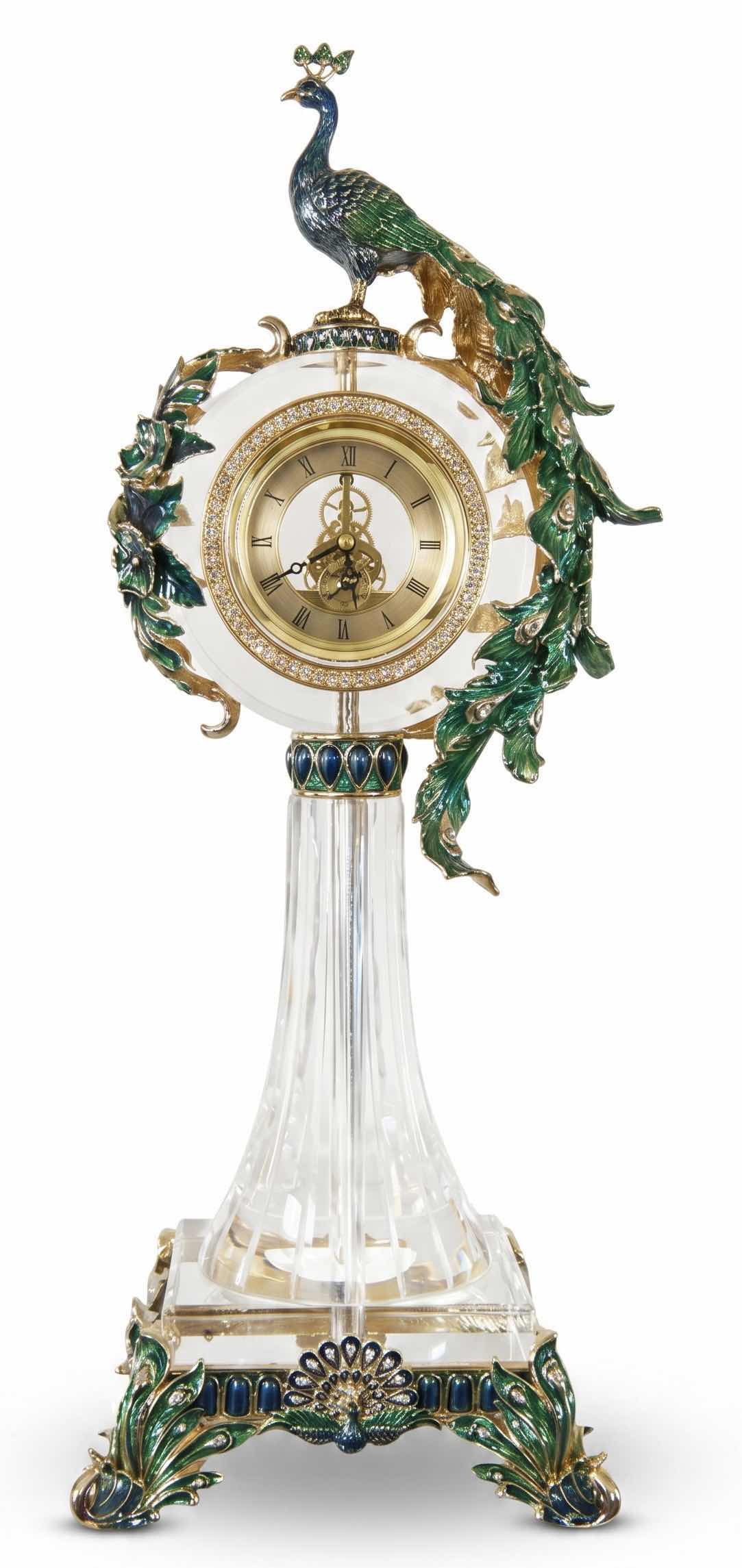 Photo 1 of REGIS GALERIE PEACOCK CRYSTAL CLOCK FEATURES AN ORNATE, ENAMELED PEACOCK FIGURE PERCHED ATOP A CLEAR CRYSTAL STAND H 24”