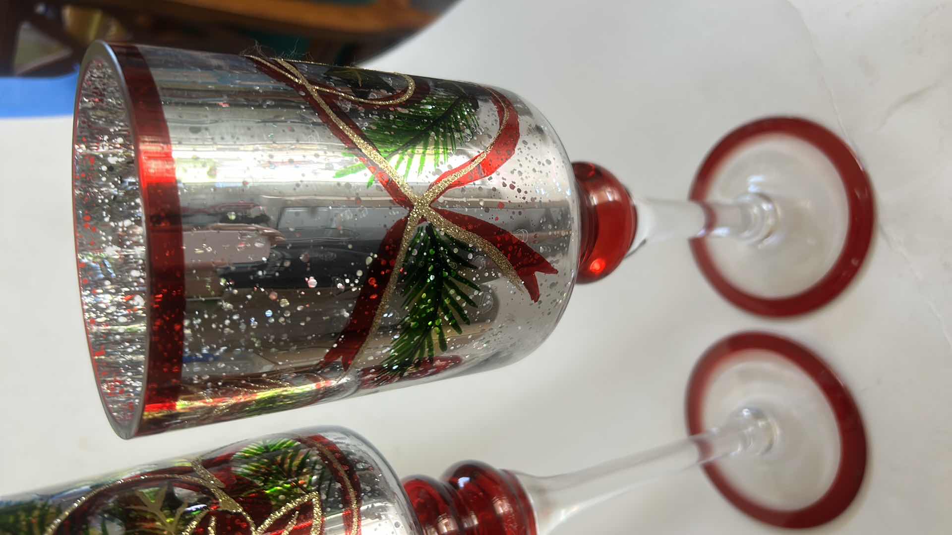 Photo 1 of TWO GLASS CHRISTMAS CANDLE HOLDERS (TALLEST H14”)