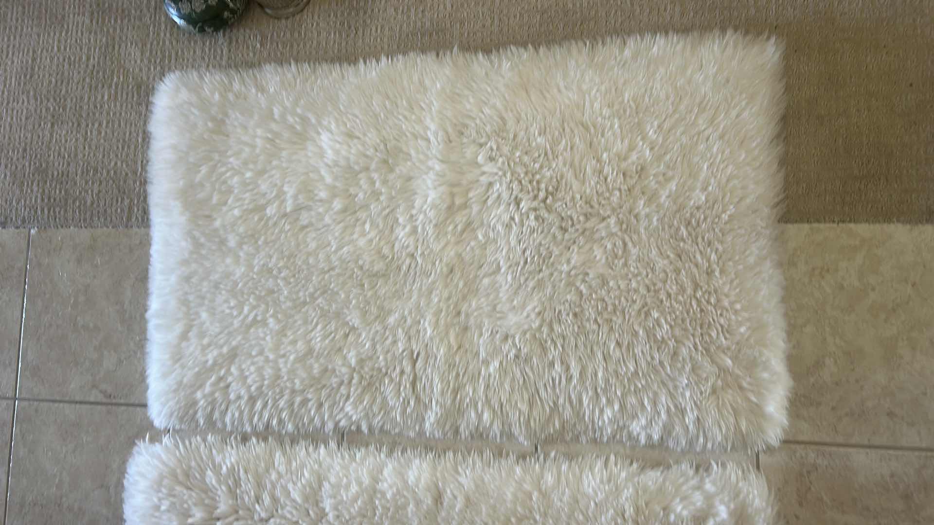 Photo 1 of TWO NEW PLUSH LAMB FUR ACCENT RUGS 24“ X 40“