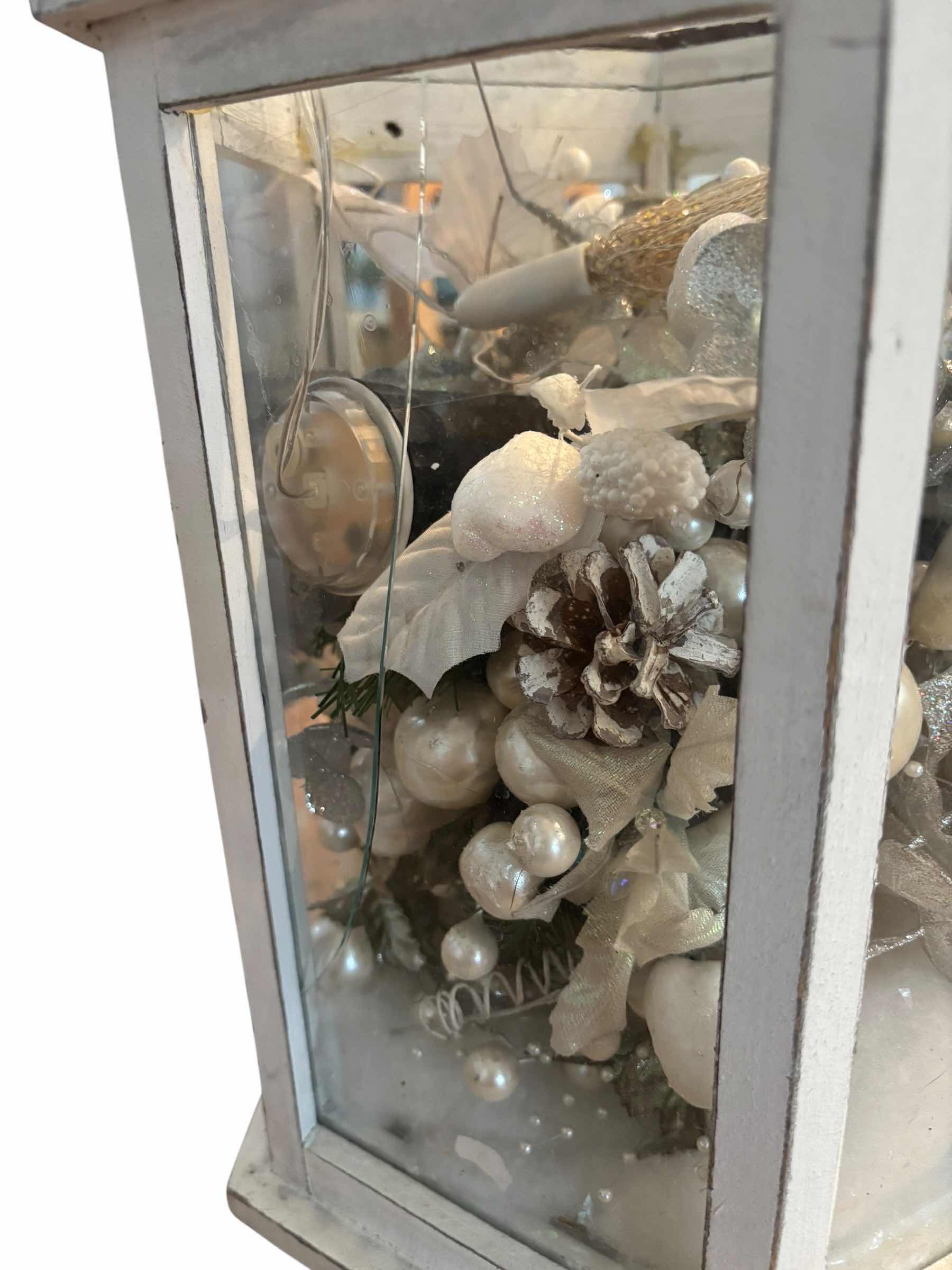 Photo 1 of DISTRESSED LANTERN WITH FESTIVE WINTER DECOR H22” (GLASS IS CRACKED)