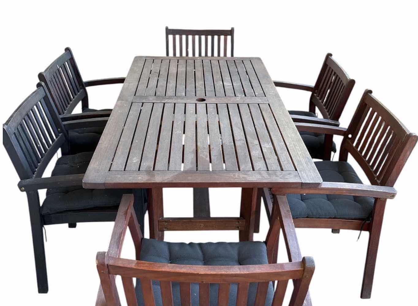 Photo 1 of (7)PCS HARDWOOD OUTDOOR PATIO DINING SET WITH RECTANGULAR SLAT-TOP TABLE, (6) ARMCHAIRS, UMBRELLA HOLE, AND BLACK SEAT CUSHIONS TABLE 59”X31.5”H30”