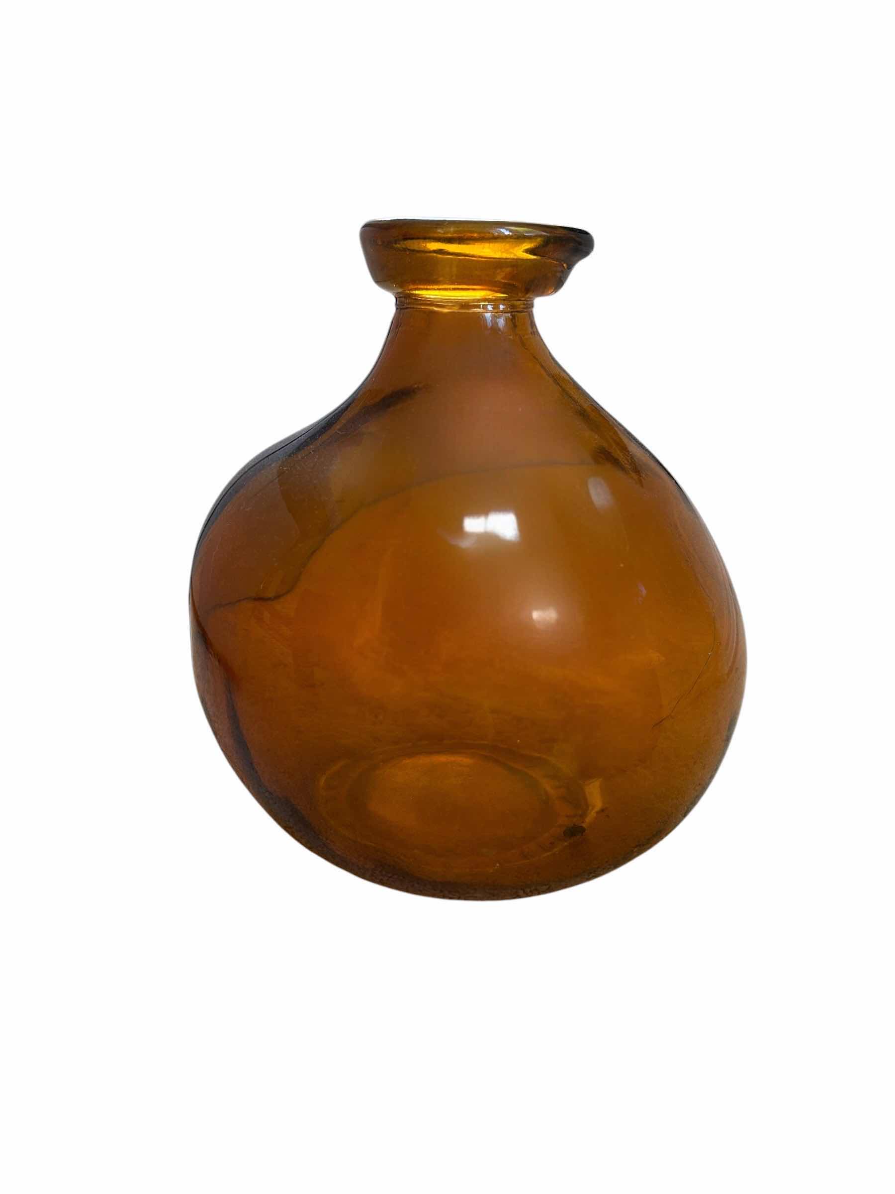 Photo 1 of AMBER GLASS SHORT WIDE VASE ($65)