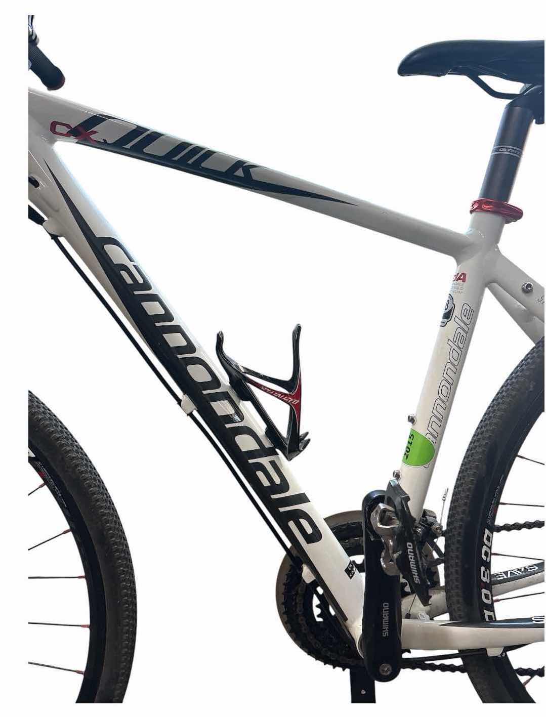 View 2 of CANNONDALE QUICK 48CM (XS)ALUMINUM HYBRID BICYCLE WITH 700C WHEELS, FRONT SUSPENSION, SHIMANO DRIVETRAIN, MECHANICAL DISC BRAKES, AND WATER BOTTLE CAGE TOTAL H42”