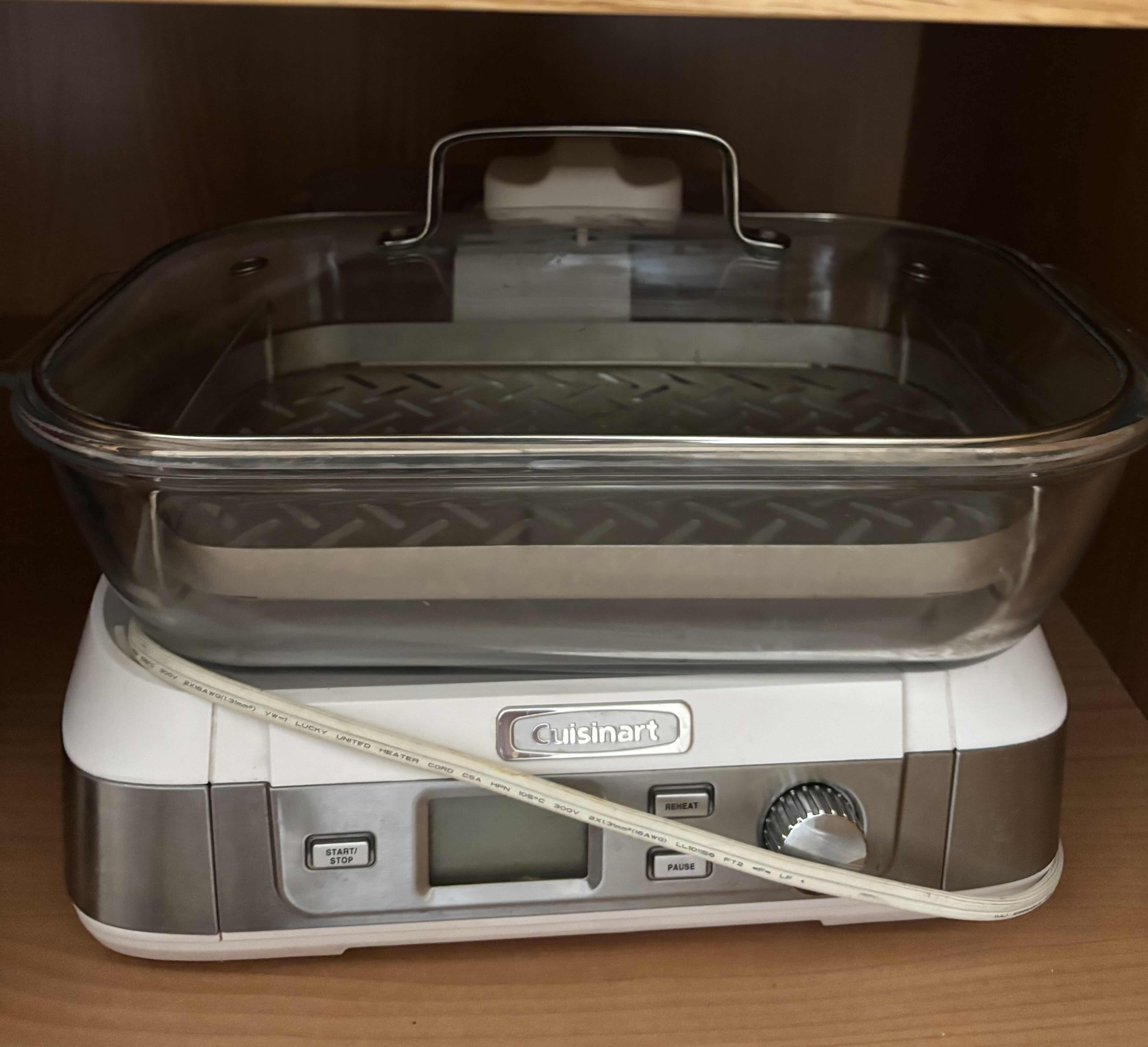 Photo 1 of CONTENTS OF KITCHEN CABINET