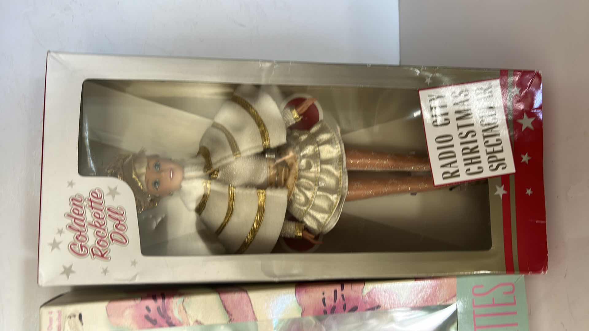 Photo 1 of 2 NIB - THE RADIO CITY ROCKETTES 65TH ANNIVERSARY DOLL & RADIO CITY CHRISTMAS SPECTACULAR GOLDEN ROCKETTE DOLL