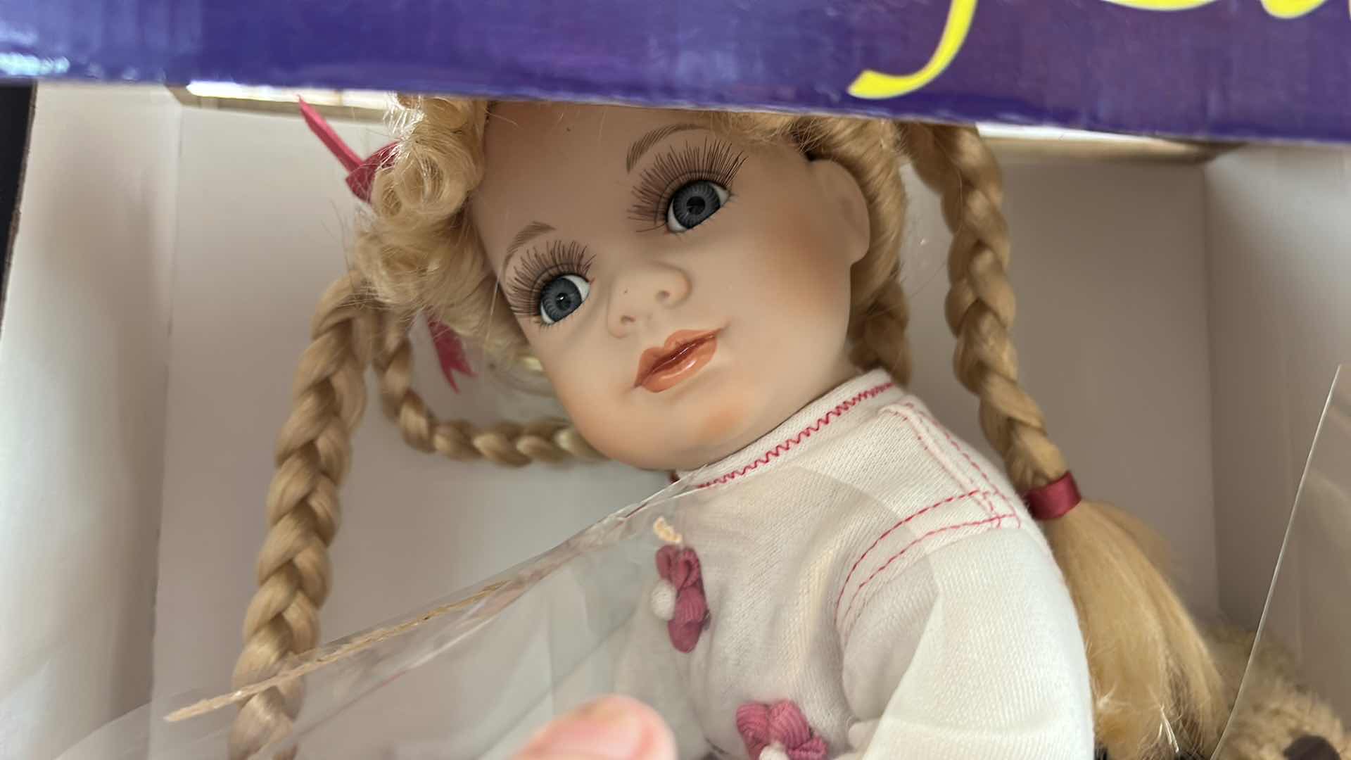 Photo 1 of NIB - VINTAGE ASHLEY BELLE "PORCELAIN KEEPSAKES" 16-INCH FINE BISQUE PORCELAIN DOLL RIDING A BICYCLE. $40