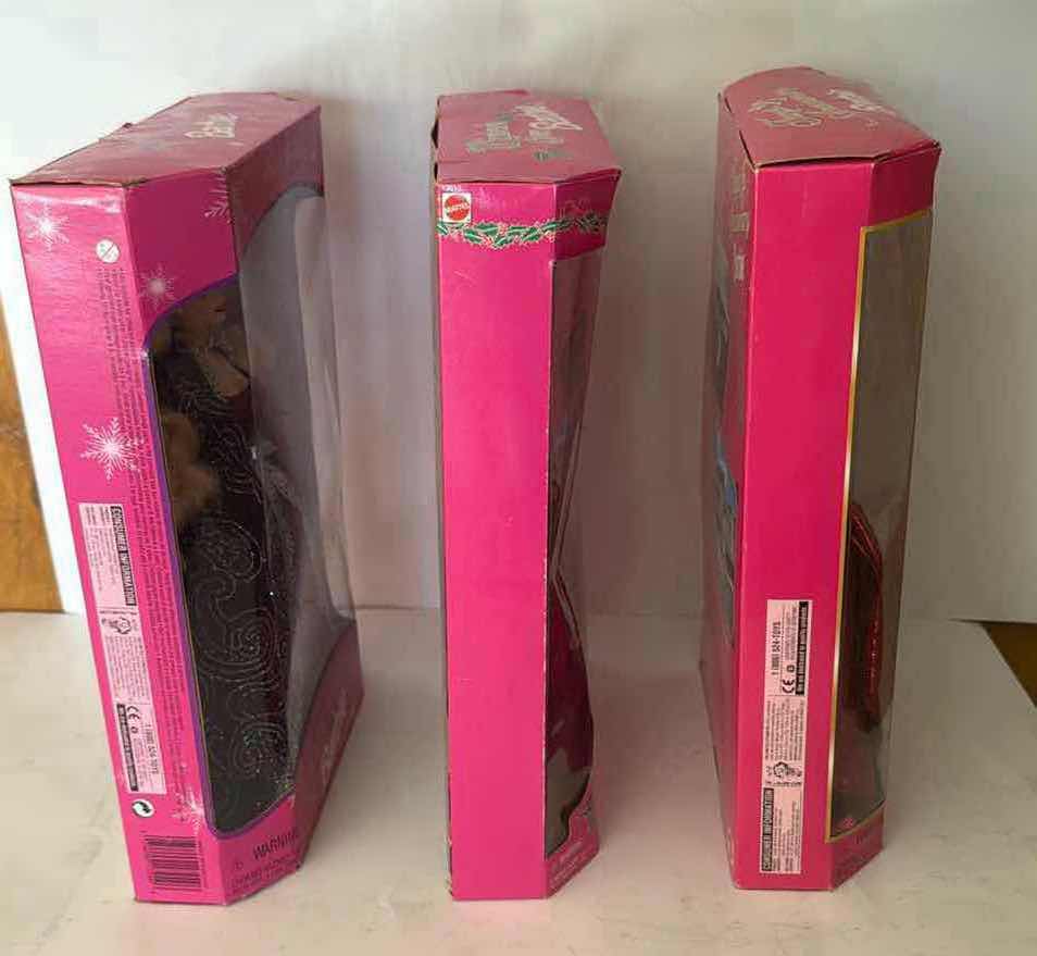 Photo 1 of 3- NIB WINTER BARBIES $80