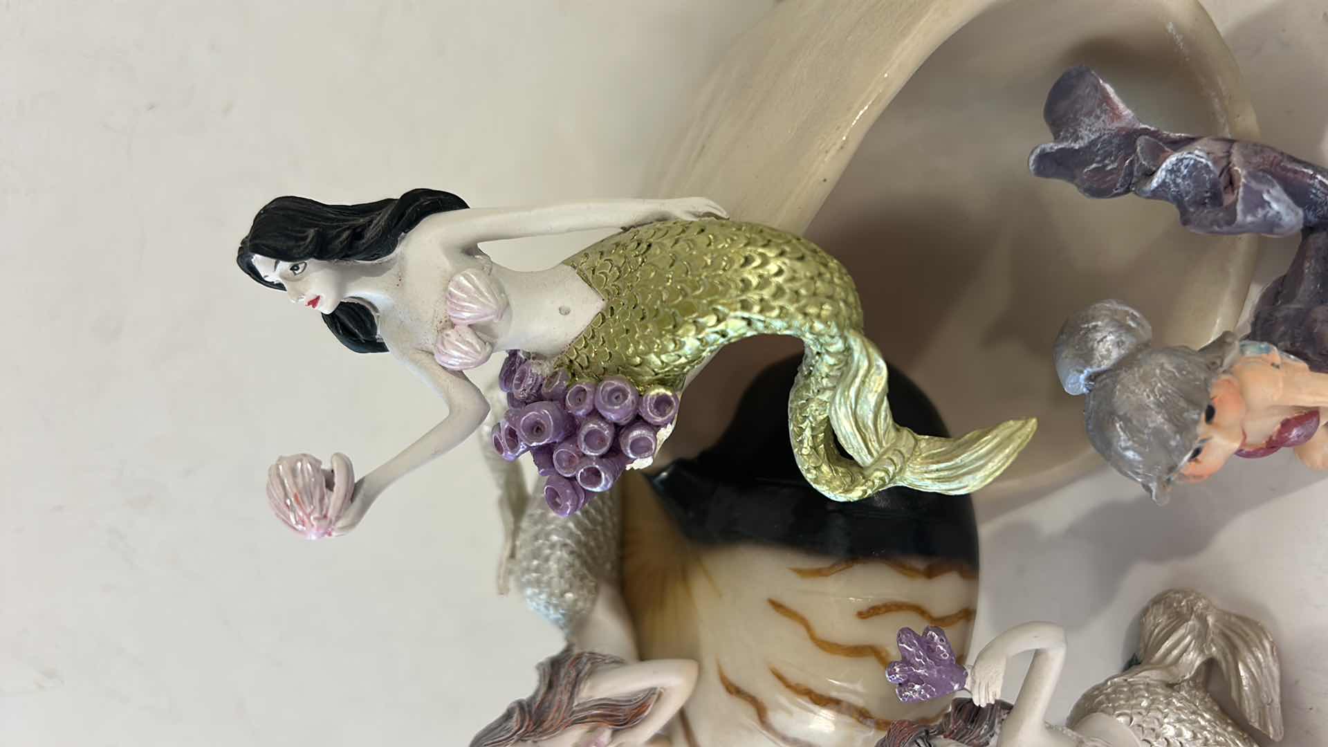 Photo 1 of 10 - SMALL MERMAID FIGURINES AND ONE SHELL.