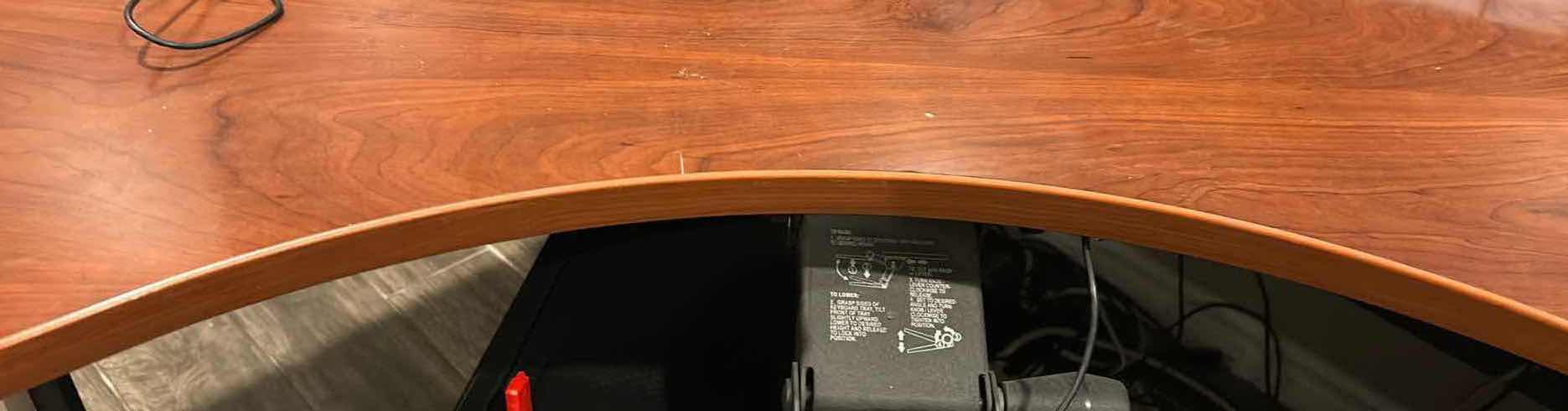 Photo 1 of BOWFRONT CHERRY FINISH TOP W BLACK BOTTOM L SHAPE OFFICE DESK 78"X 58"