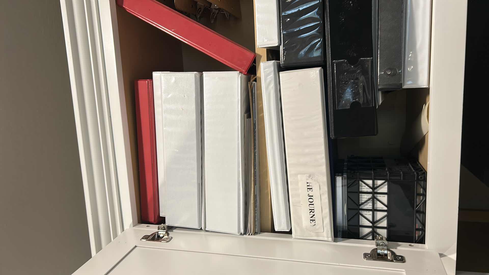 Photo 1 of CONTENTS OF CABINET ASSORTED BINDERS