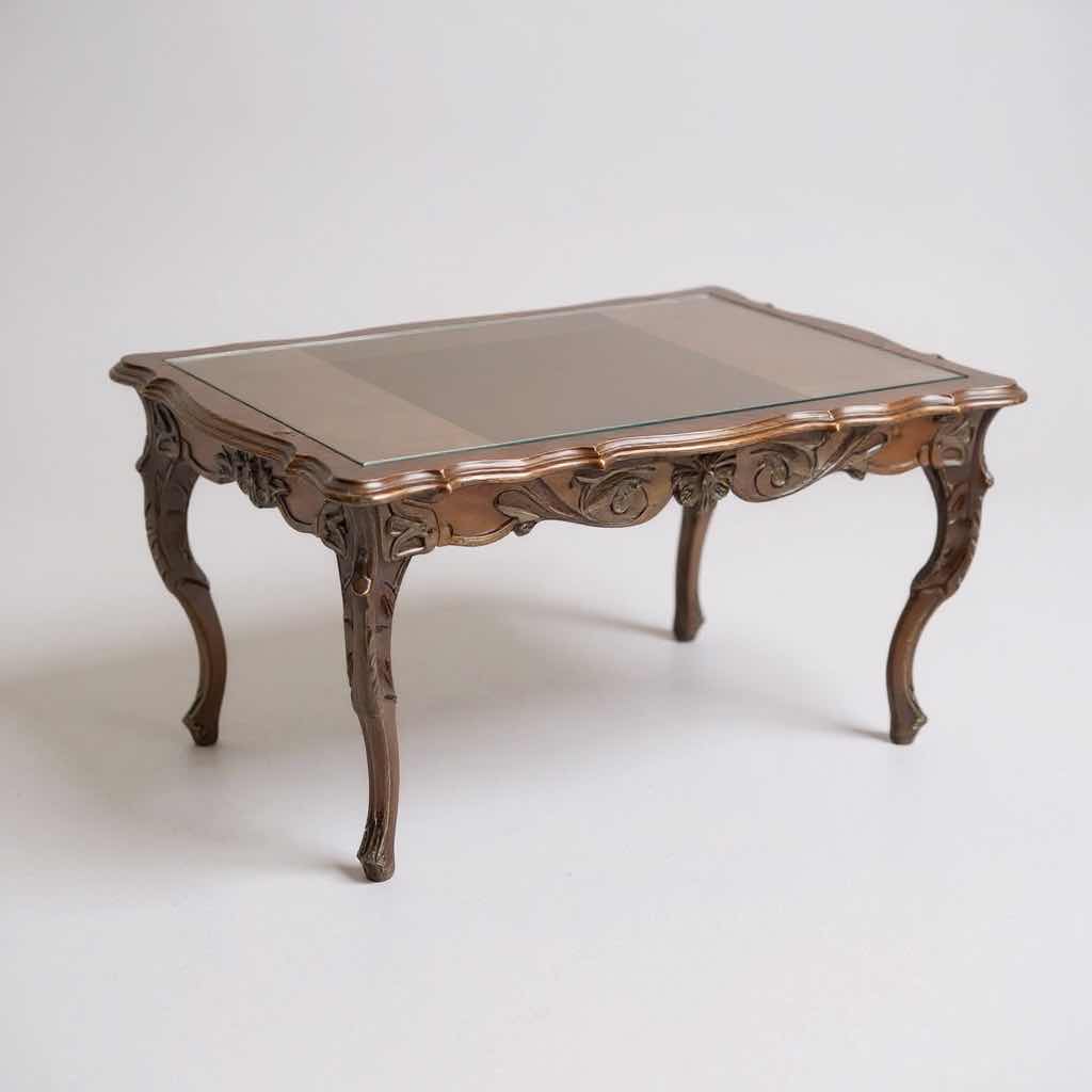 Photo 1 of CARVED WOOD W GLASS TOP INSET COFFEE TABLE 33”x18” H70”