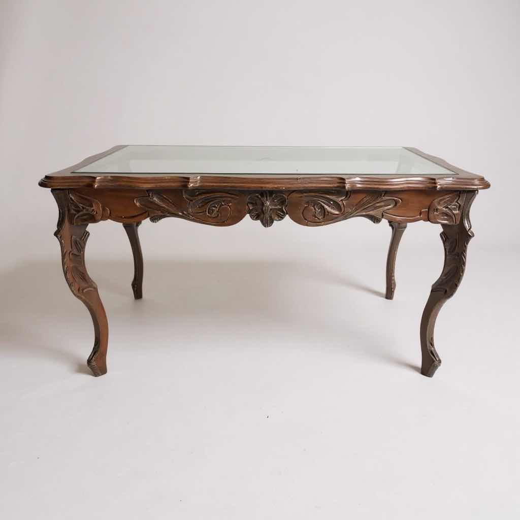 Photo 1 of CARVED WOOD W GLASS TOP INSET COFFEE TABLE 33”x18” H70”