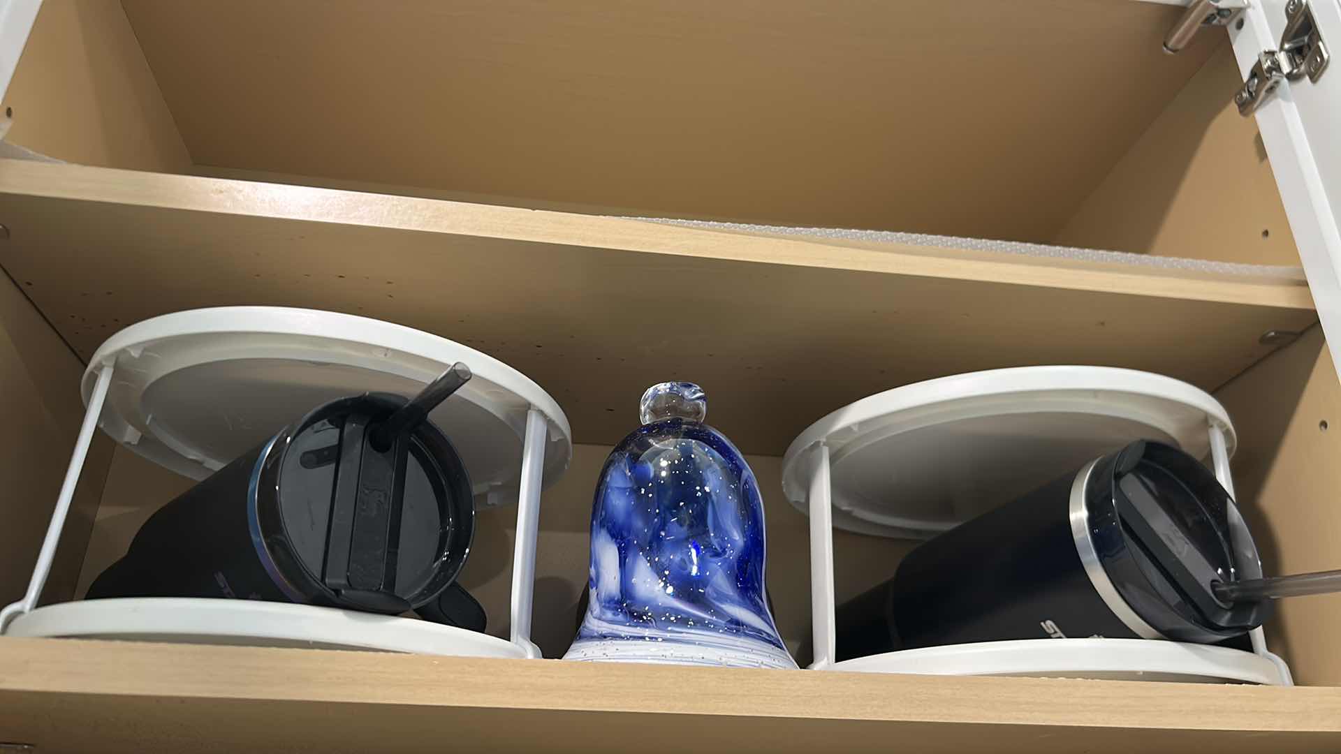 Photo 1 of CONTENTS OF CABINET CANDLES KITCHEN WARE