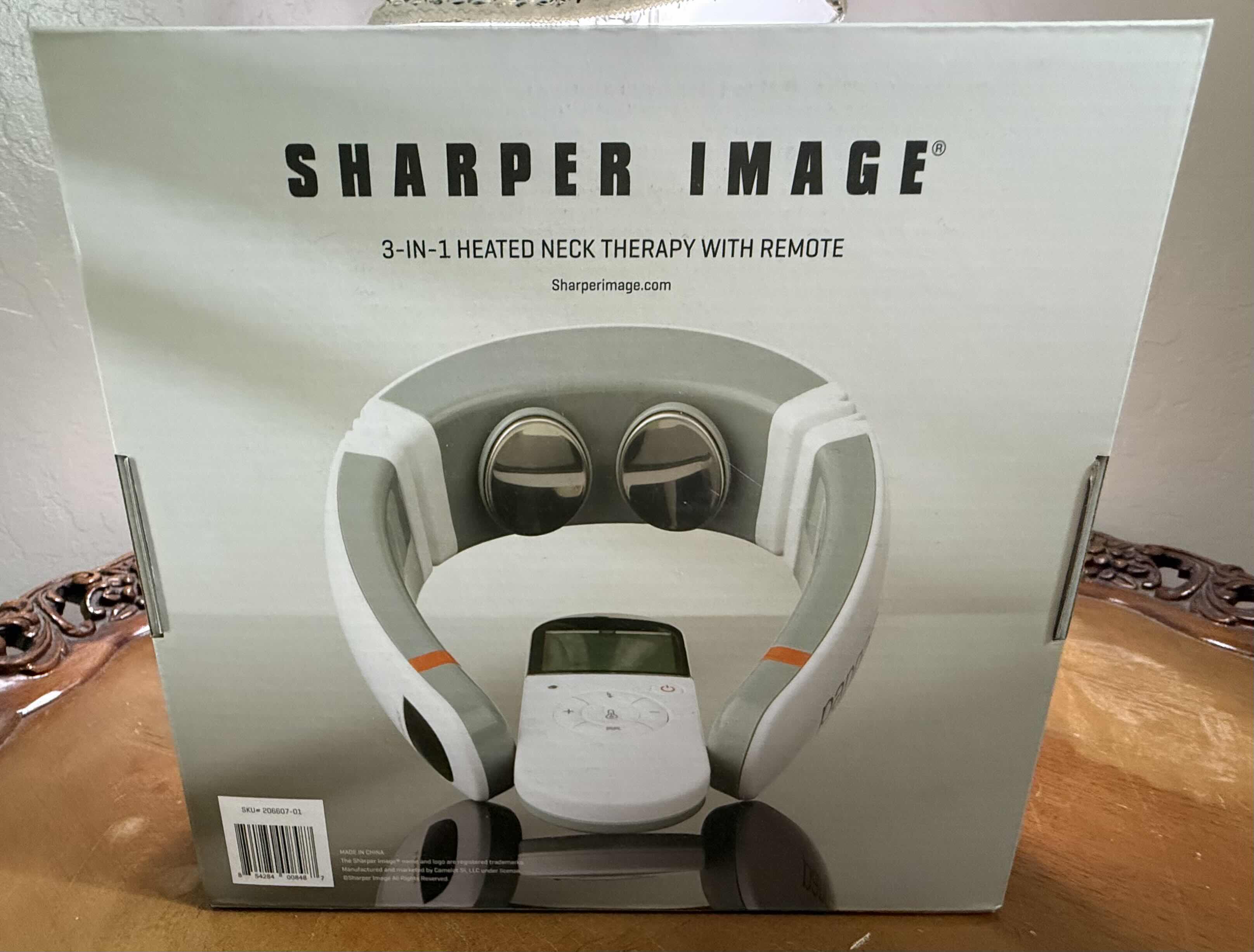 Photo 1 of NIB SHARPER IMAGE 3-IN-1 NECK THERAPY W REMOTE