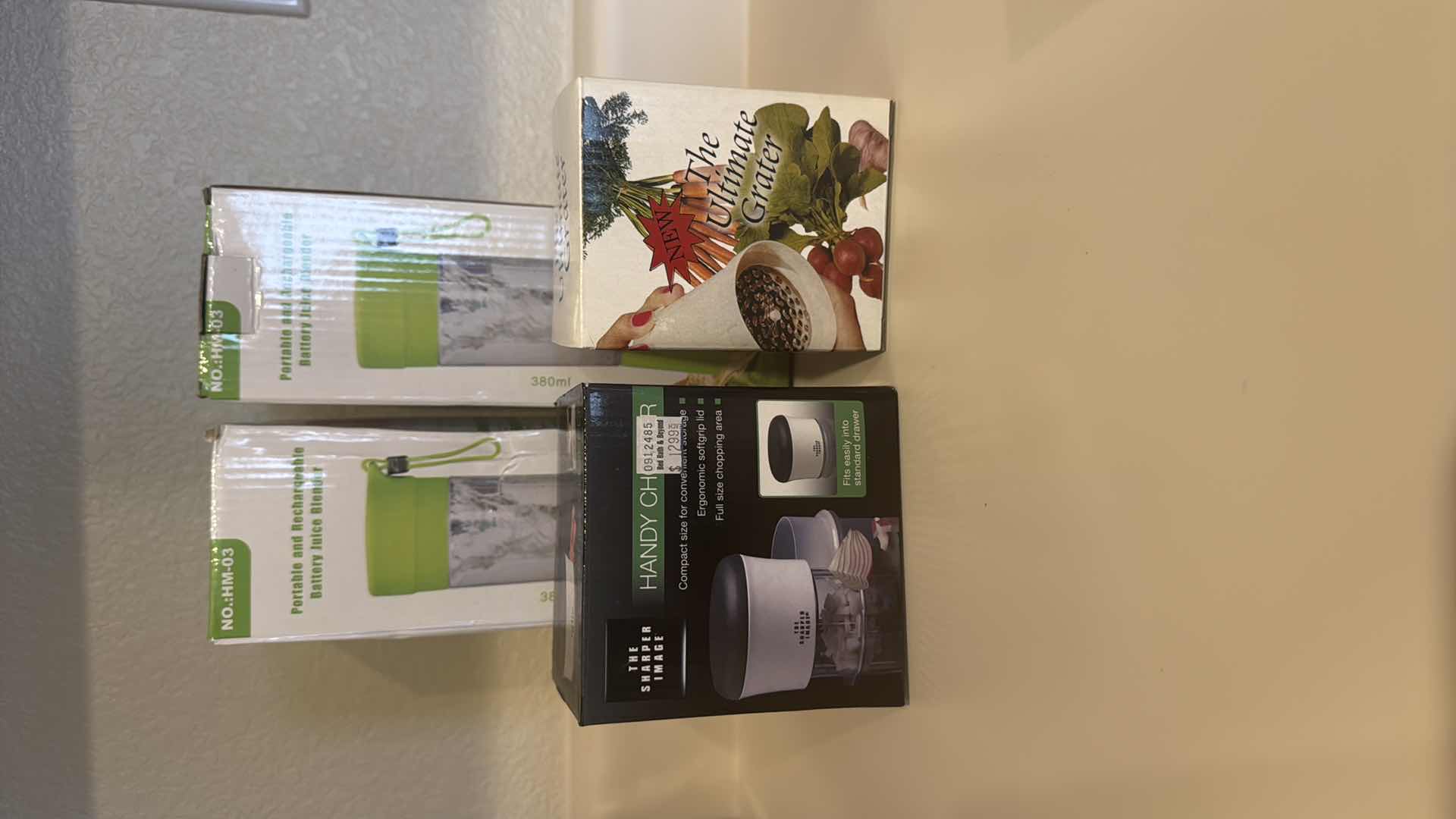 Photo 1 of 2-NIB PORTABLE JUICERS, ULTIMATE GRATER, SHARPER IMAGE HANDY CHOPPER