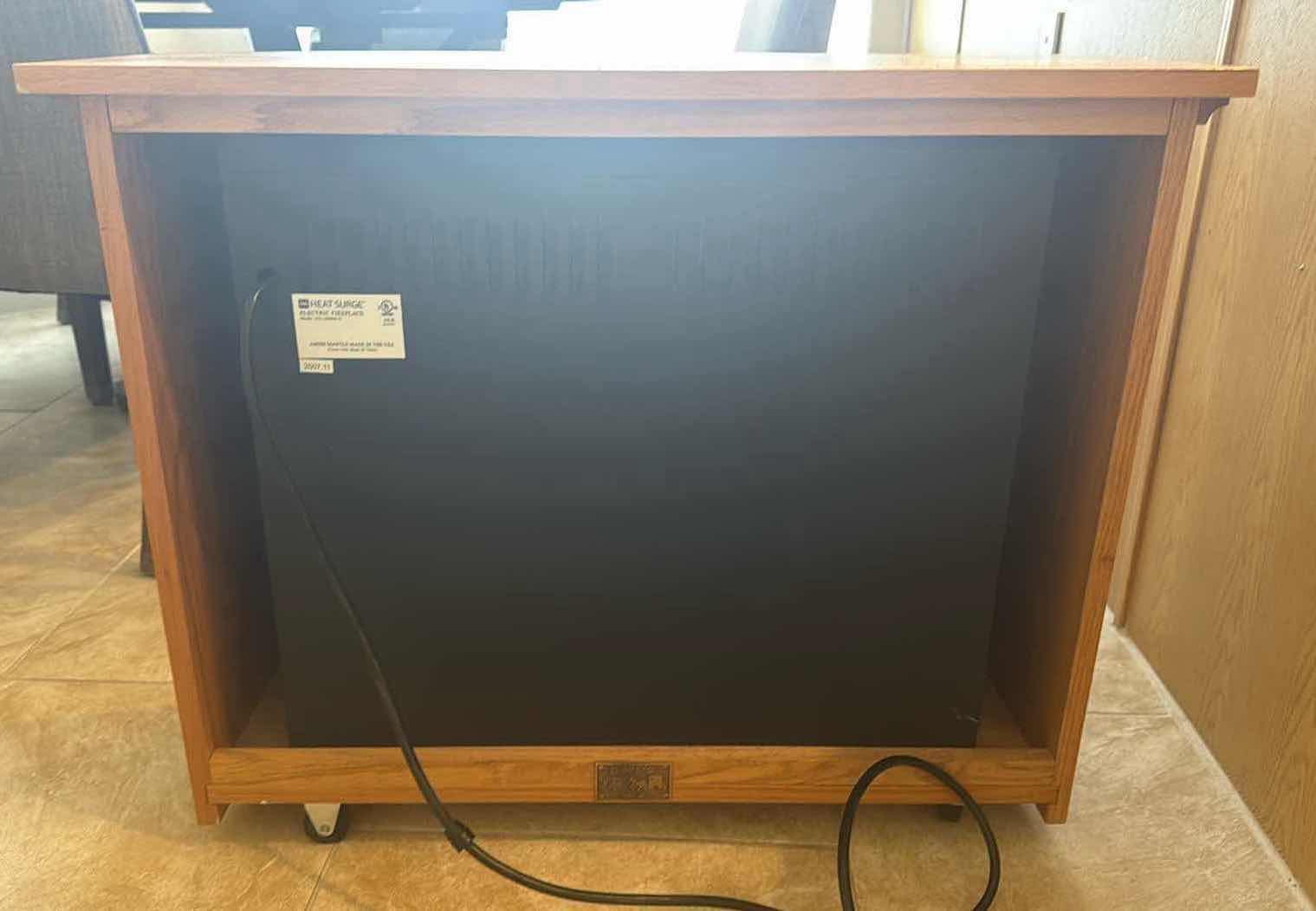 Photo 1 of HEAT SURGE ELECTRIC PORTABLE FIREPLACE IN WOOD CABINET 32”x12” H36”