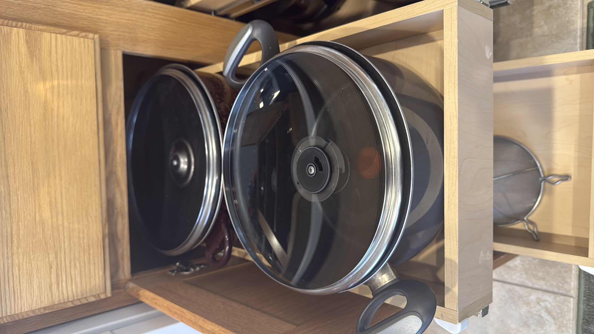 Photo 1 of CONTENTS OF KITCHEN CABINET-POTS & PANS