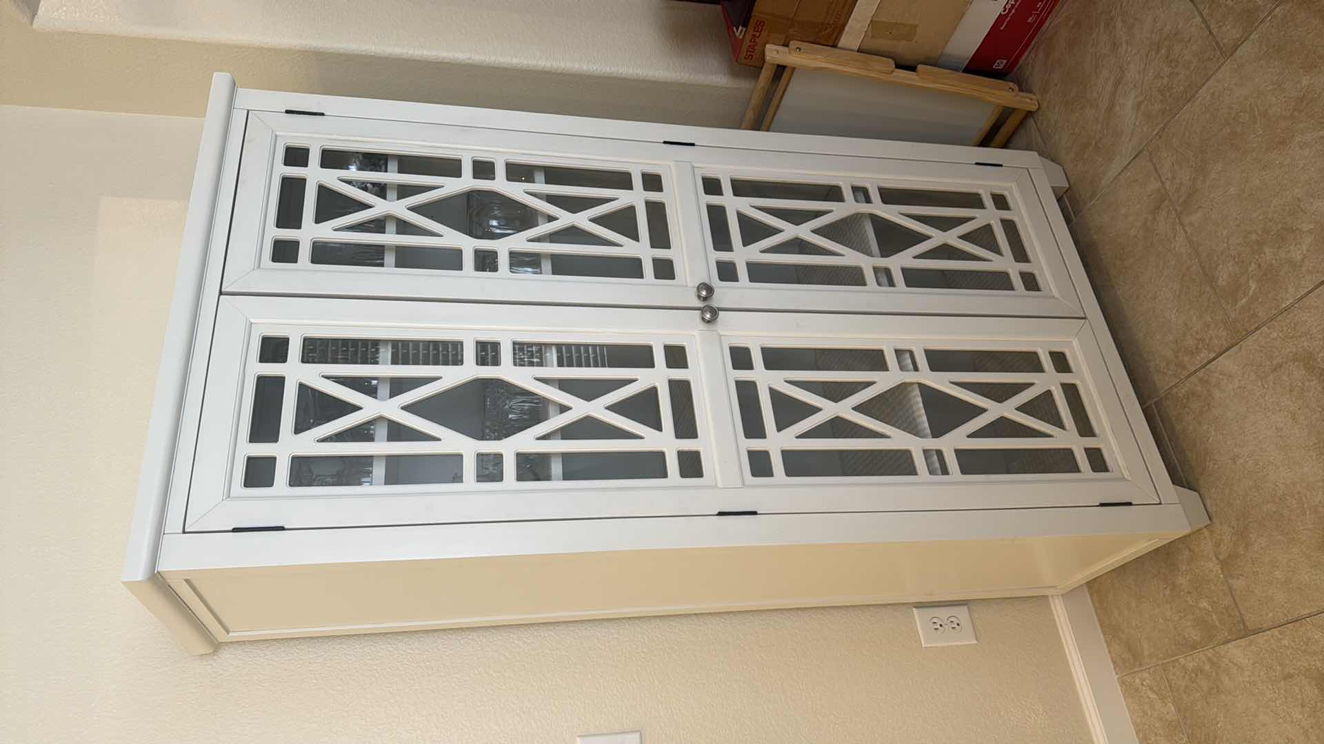 Photo 1 of WHITE WOODEN CURIO DISPLAY CABINET W. CONTENTS W GEOMETRIC OVERLAY 35” x 16” H68”