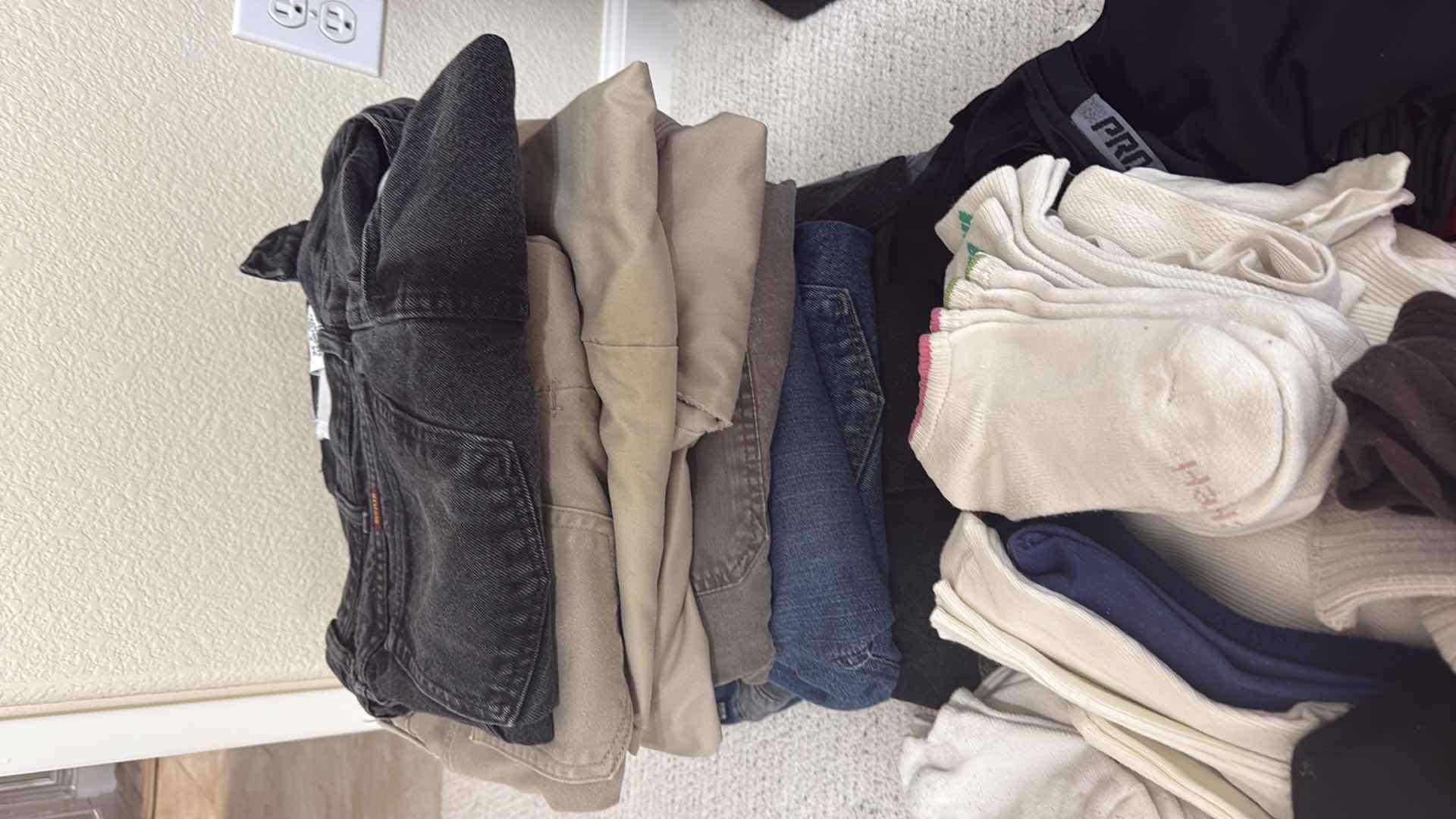 Photo 1 of MEN’S CLOTHING (PANTS 34x32)