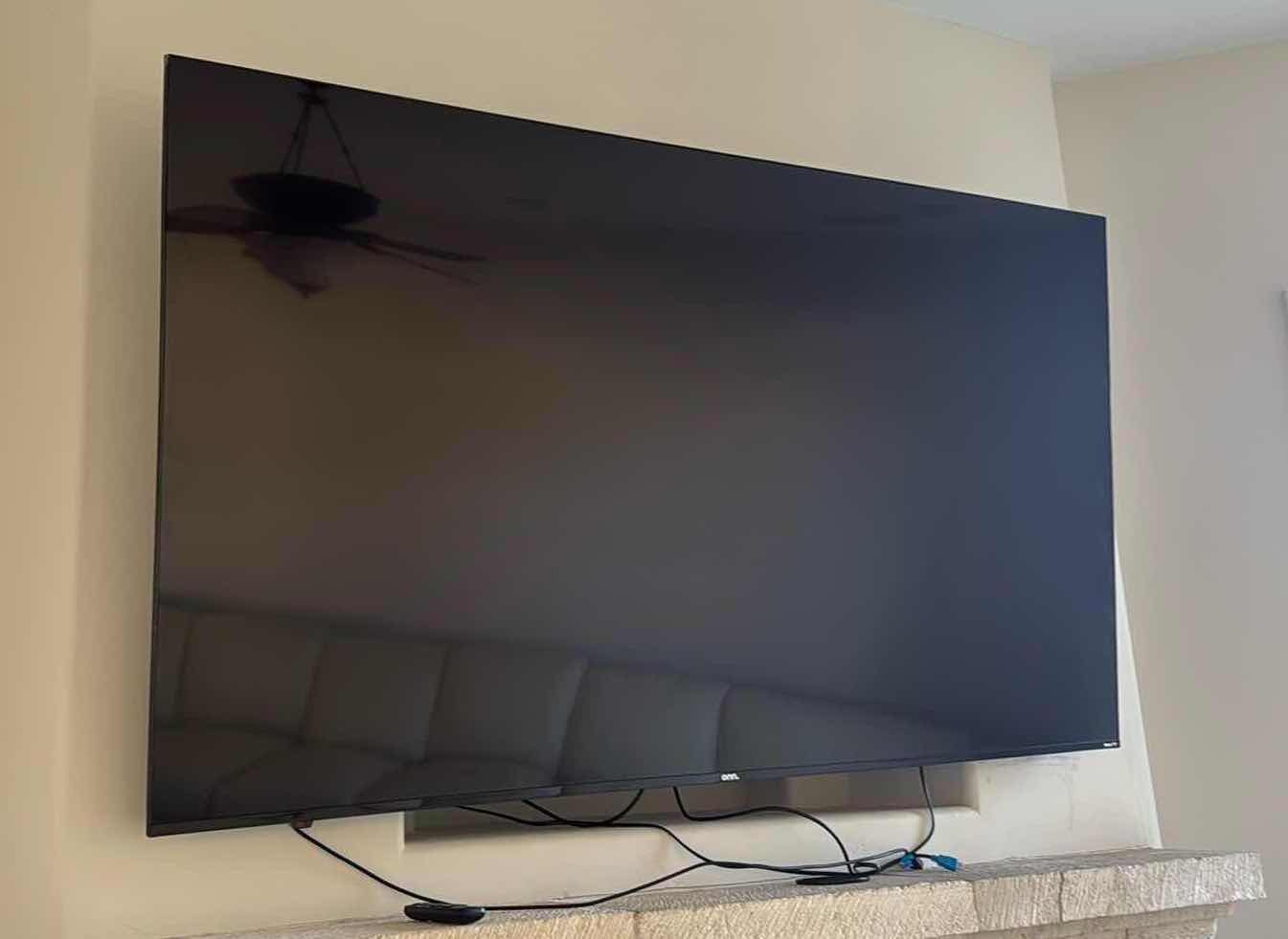 Photo 1 of 75” ROKU FLATSCREEN TV W WALL BRACKET & REMOTE