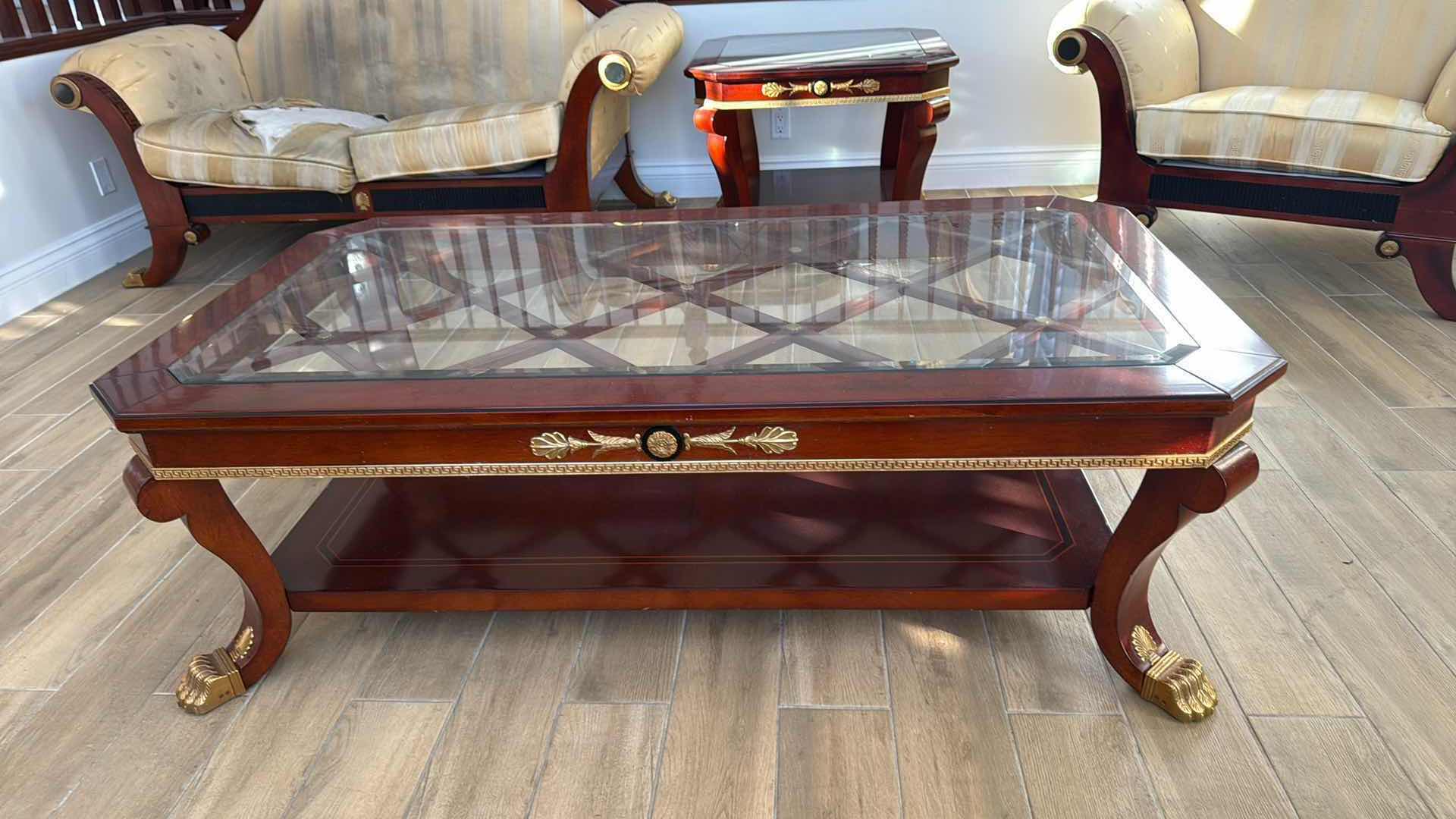 Photo 1 of VERSACE-STYLE SOLID WOOD COFFEE TABLE W GLASS TOP & GOLD TRIMMINGS 59” x 33” H19"