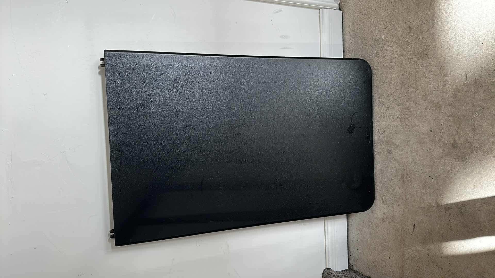 Photo 1 of 8' BLACK COSCO UTILITY FOLDING TABLE