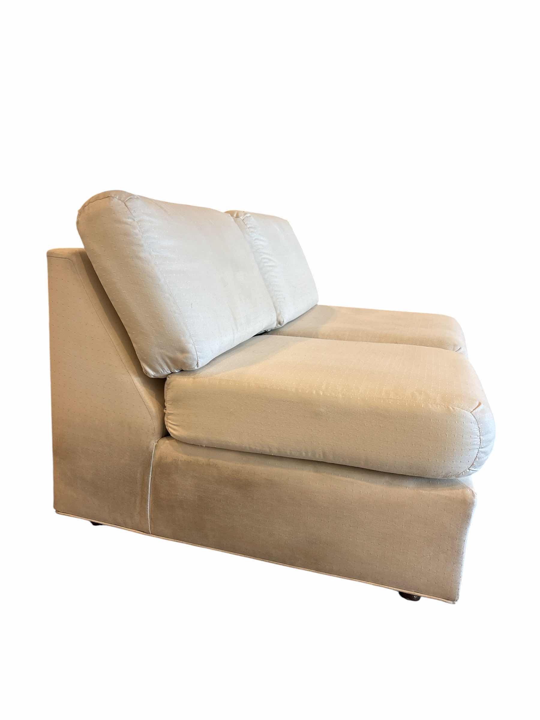 Photo 1 of 4' CREAM TEXTURED ARMLESS LOVESEAT