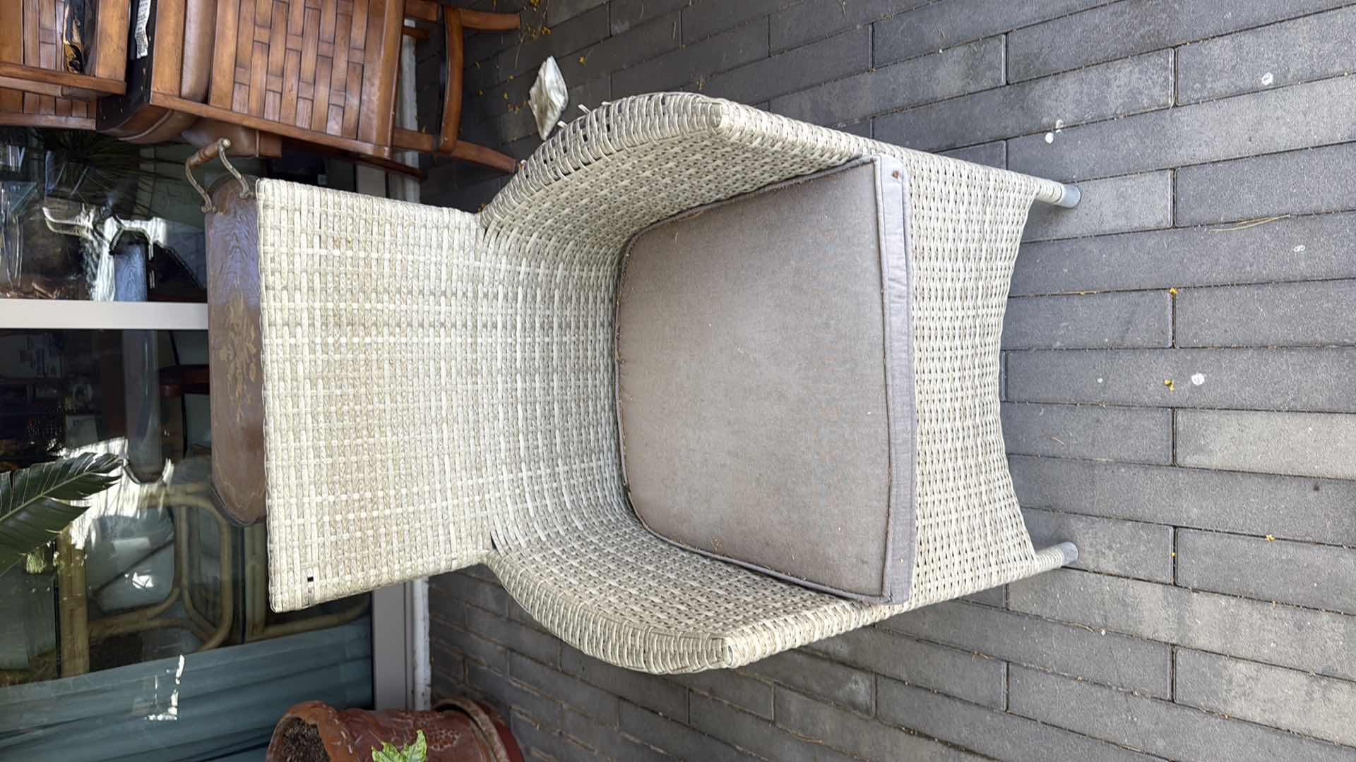 Photo 1 of WICKER PATIO LIGHT GRAY TABLE W GLASS TOP PROTECTOR & 6 ARM CHAIRS 79” x 40” H29” (SEE NOTES)